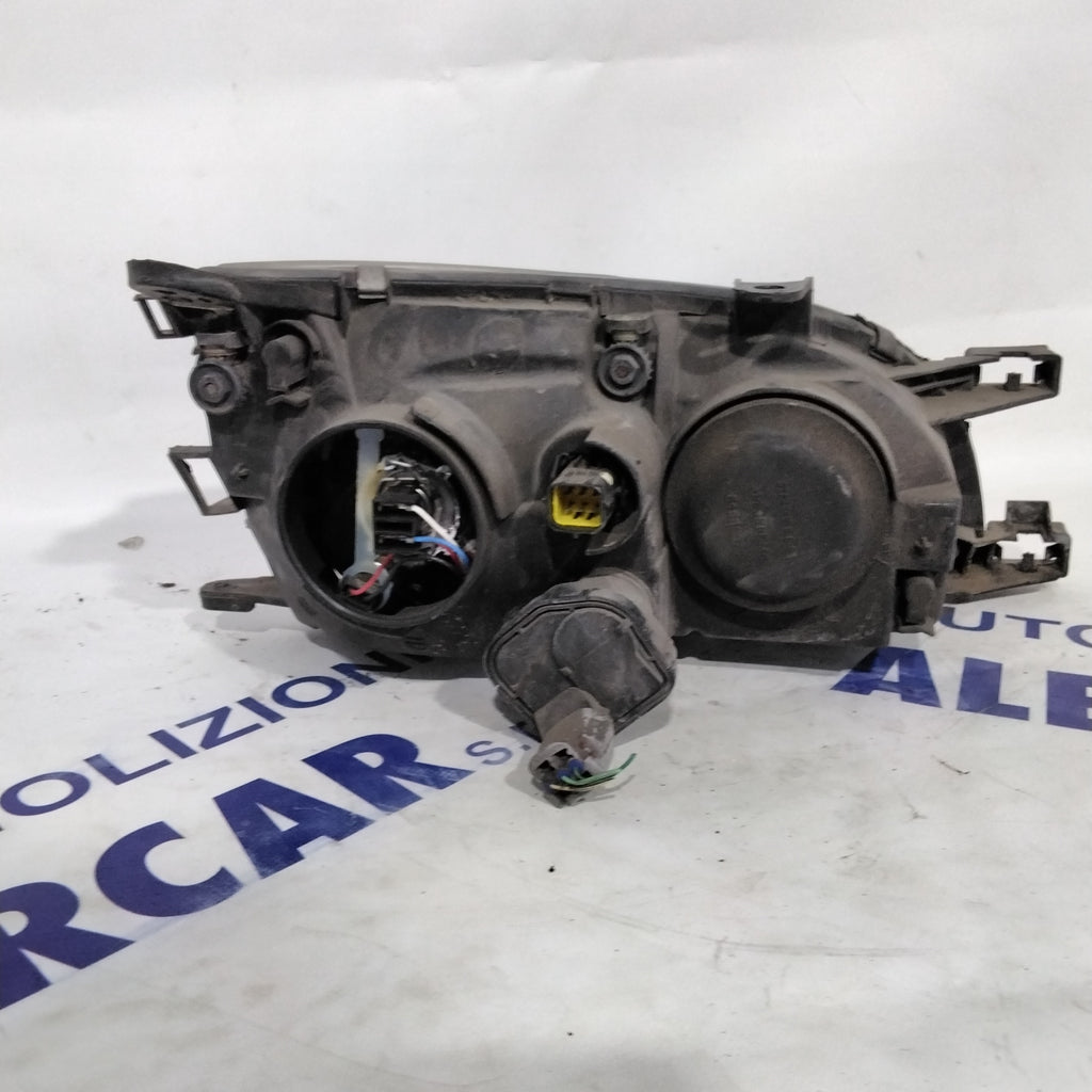 Headlight Nissan Avensis left 2000 code: 54533366 (sf8p4)