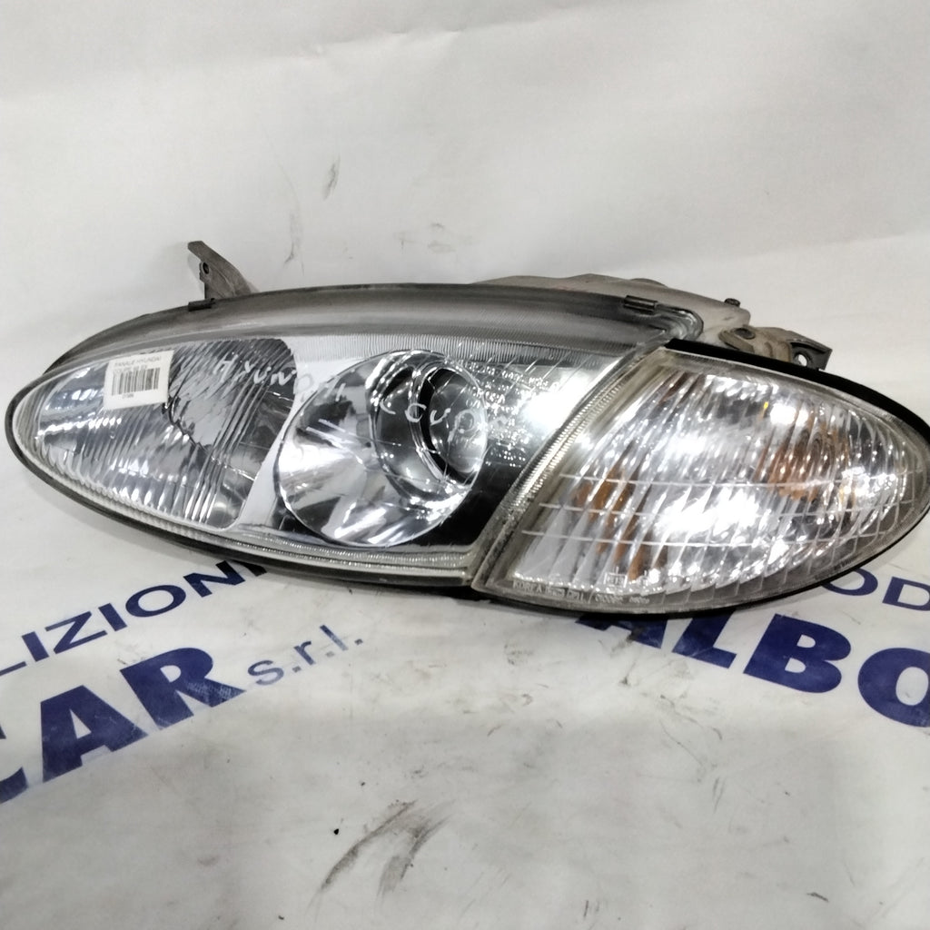 Faro fanale hyundai coupe sinistro anno 1998 codice: 1010495 (sf8p4)