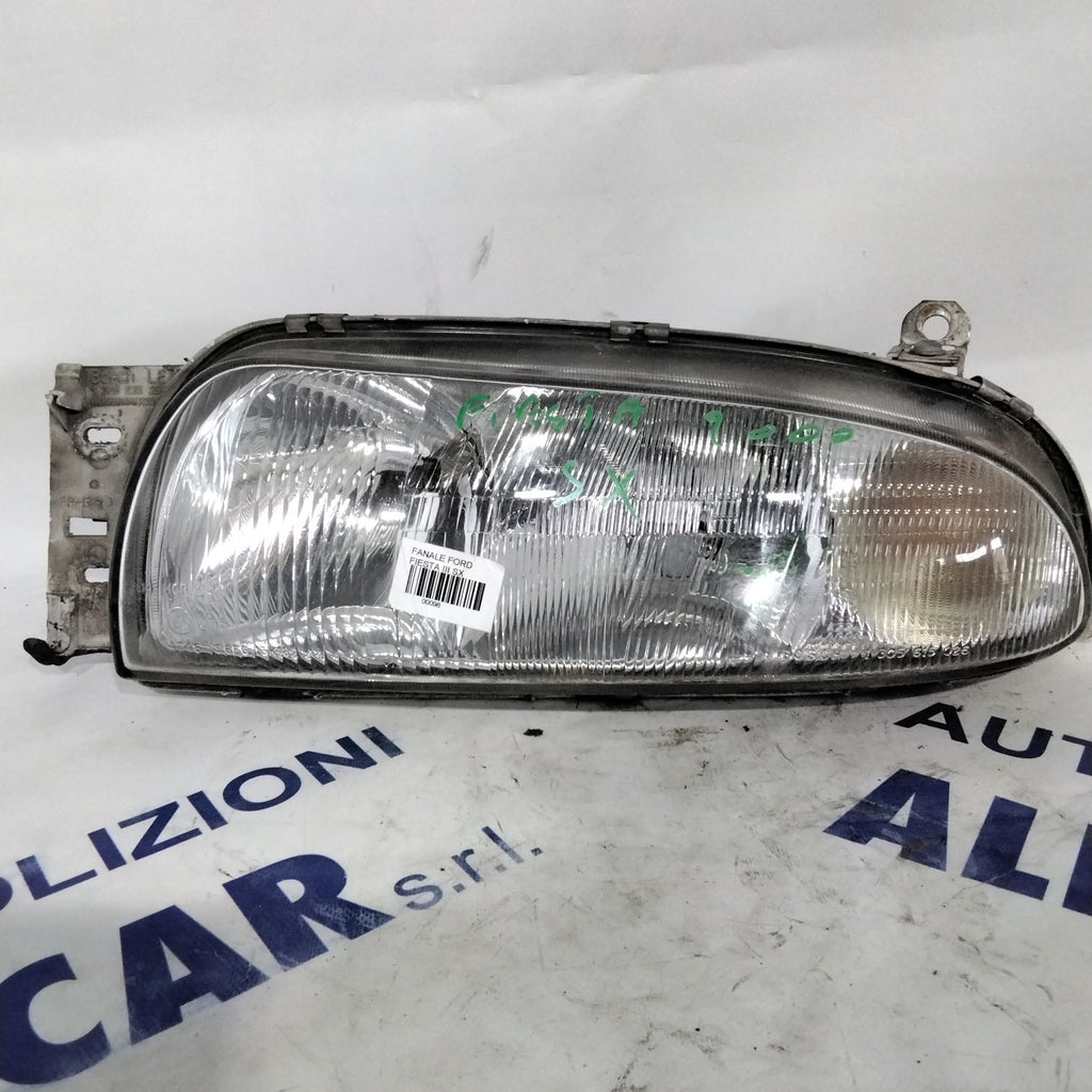 Left headlamp Ford Fiesta year 2000 code: 0301049201 (sf8p3)