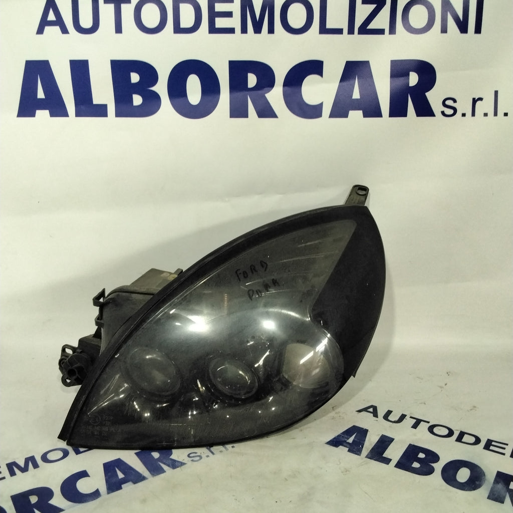 Left headlight Ford Puma year 2002 code: 0301155203 (sf8p3)