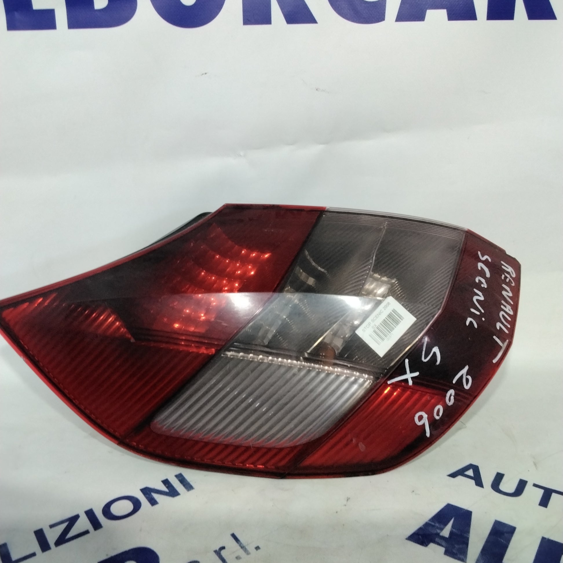 Renault Scenic left stop light year 2006 code: 82000127704 (sf9p1)