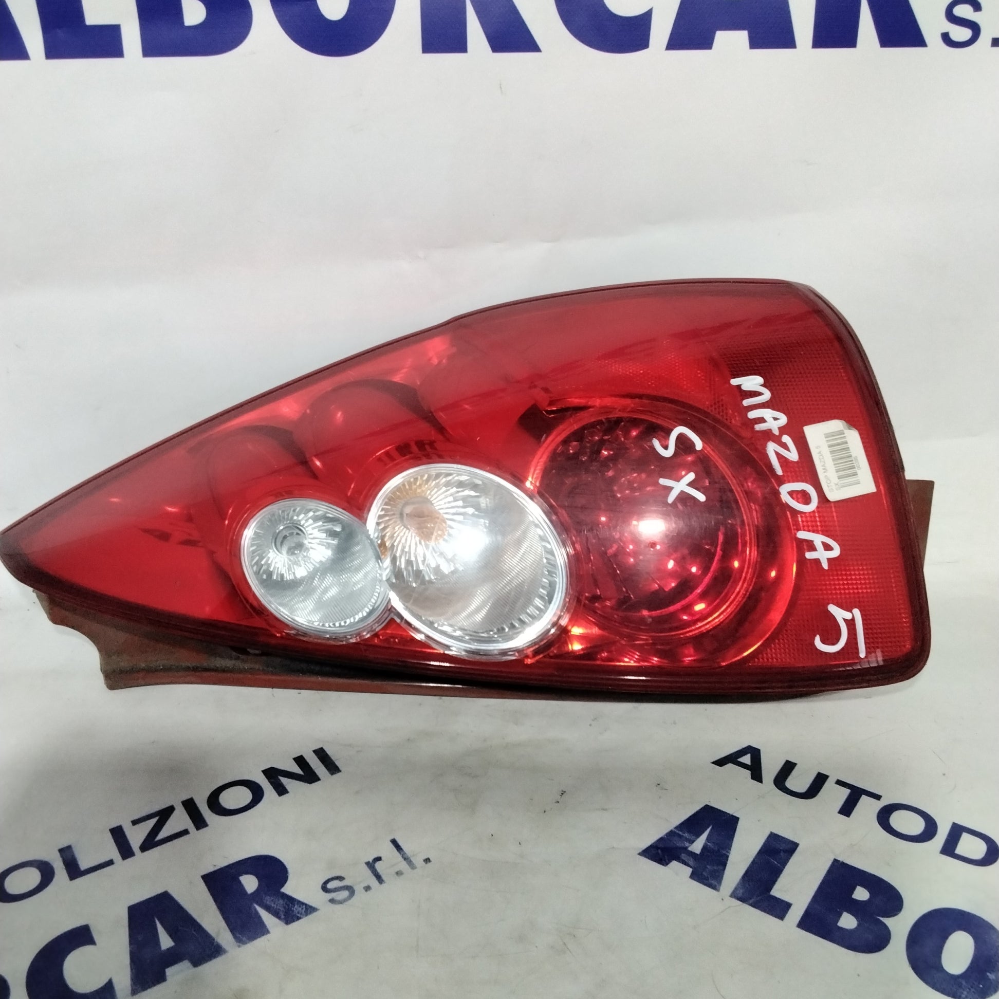 Mazda 5 sedan left stop light year 2006 code: C23551150 (sf9p1)
