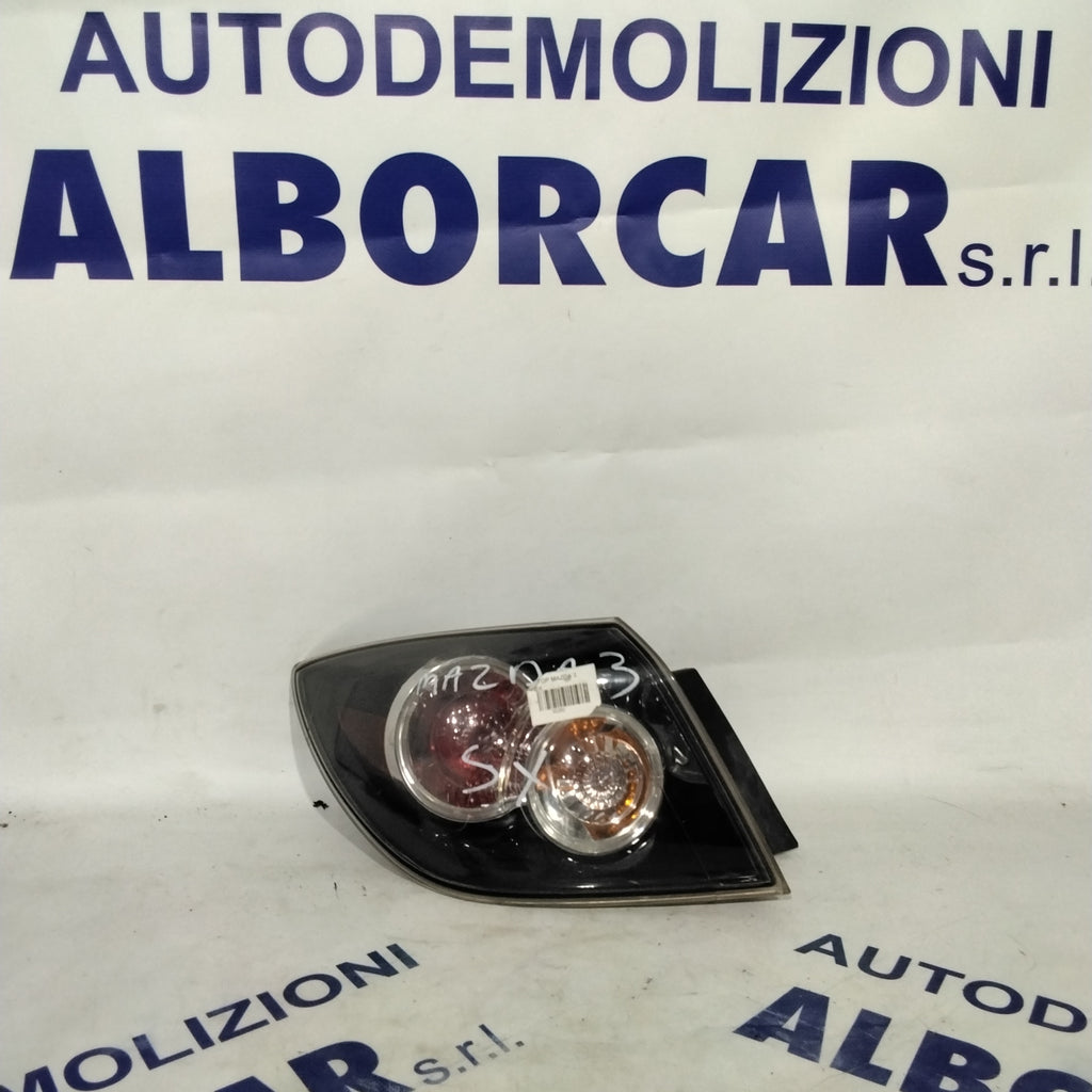left tail light Mazda 3 year 2006 code A051671