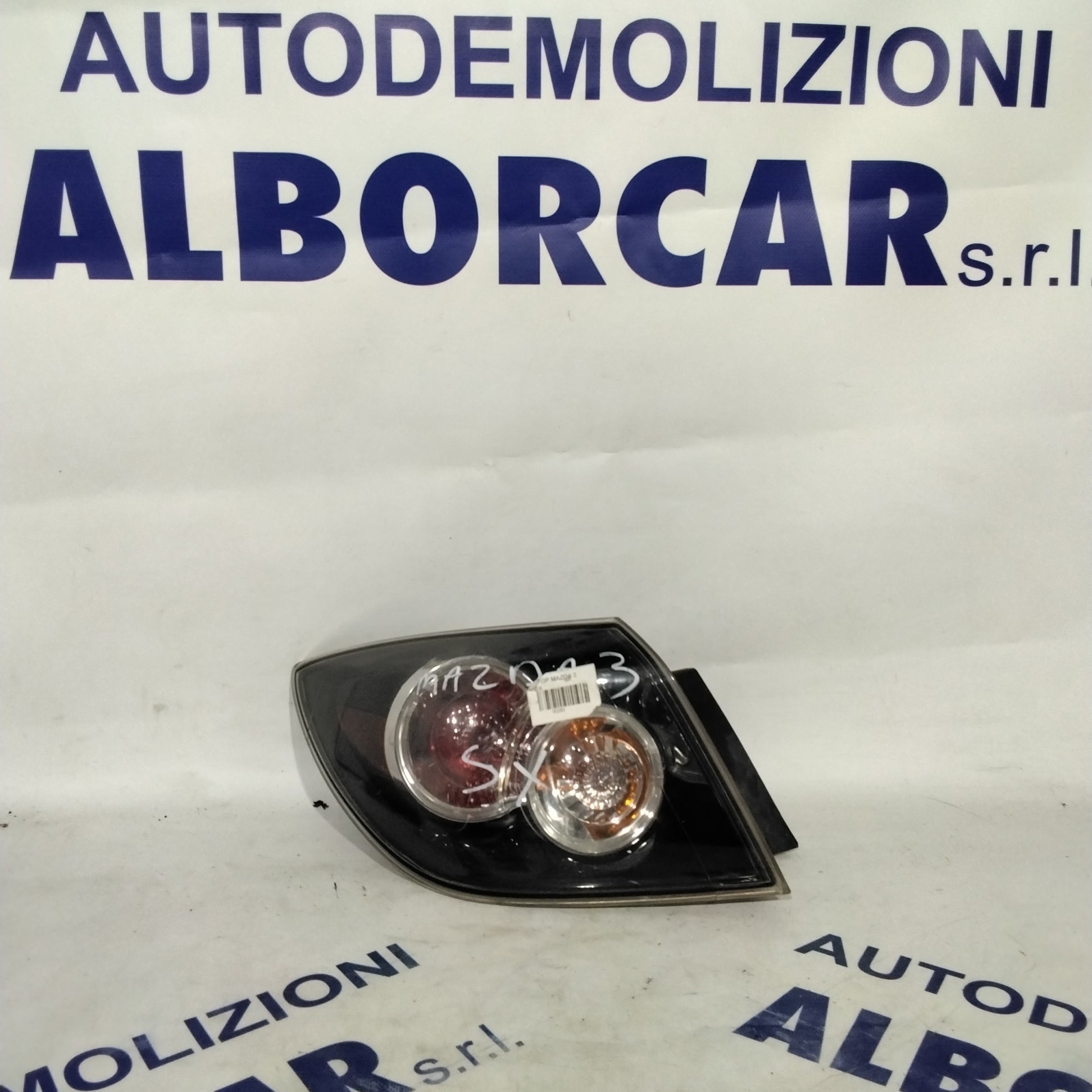 left tail light Mazda 3 year 2006 code A051671