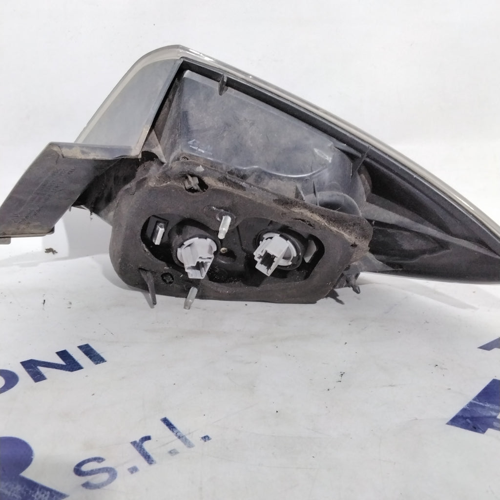 left tail light Mazda 3 year 2006 code A051671