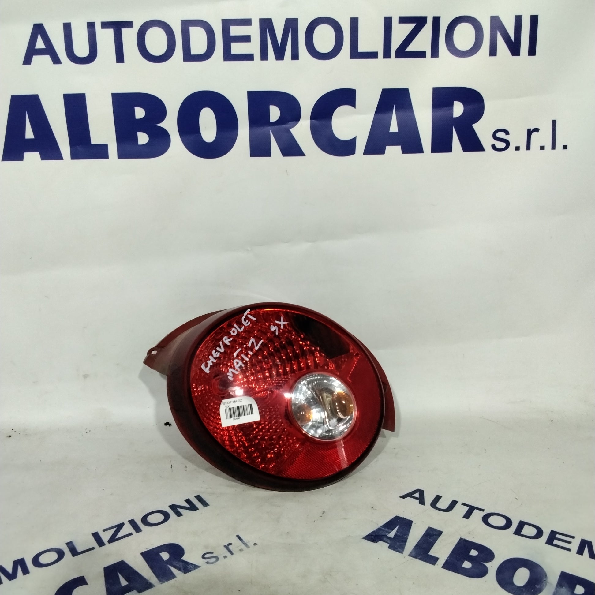 left tail light Chevrolet Matiz year 2006 code 300411L