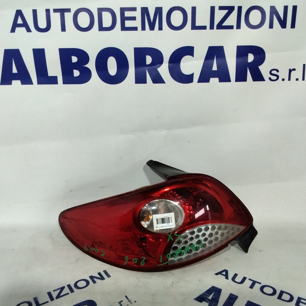 Peugeot 206 left tail light year 2009 code: 118058B (sf9p4)