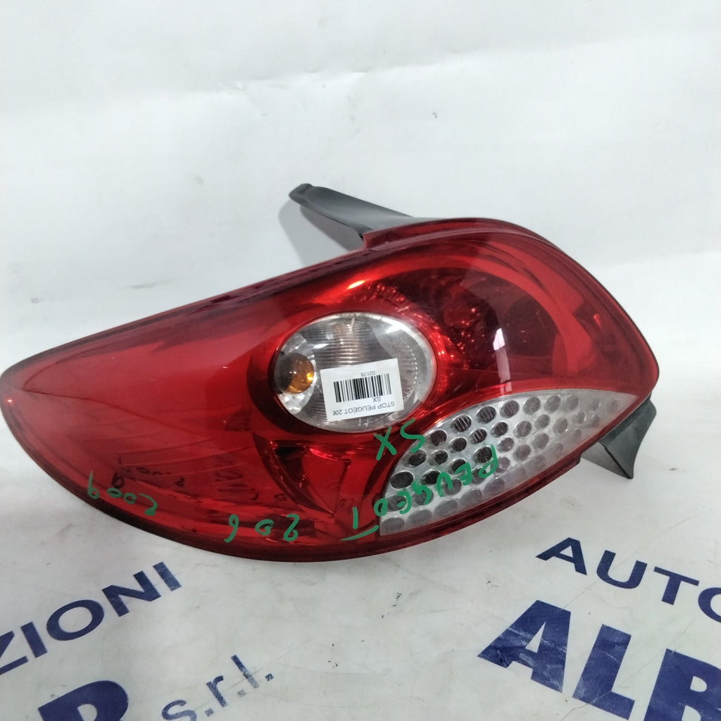 Peugeot 206 left tail light year 2009 code: 118058B (sf9p4)