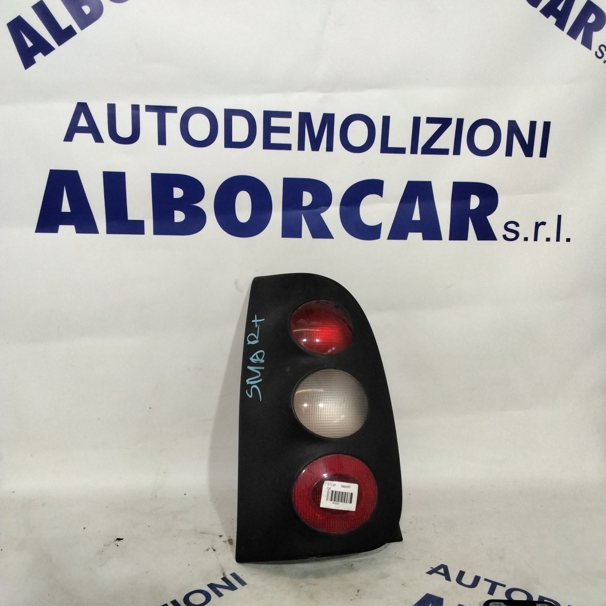 Fanale stop smart sinistro  coupe benzina cilindrata: 600 anno  2002-2004  colore nero con lampadina gialla e bianca codice: 253041L
