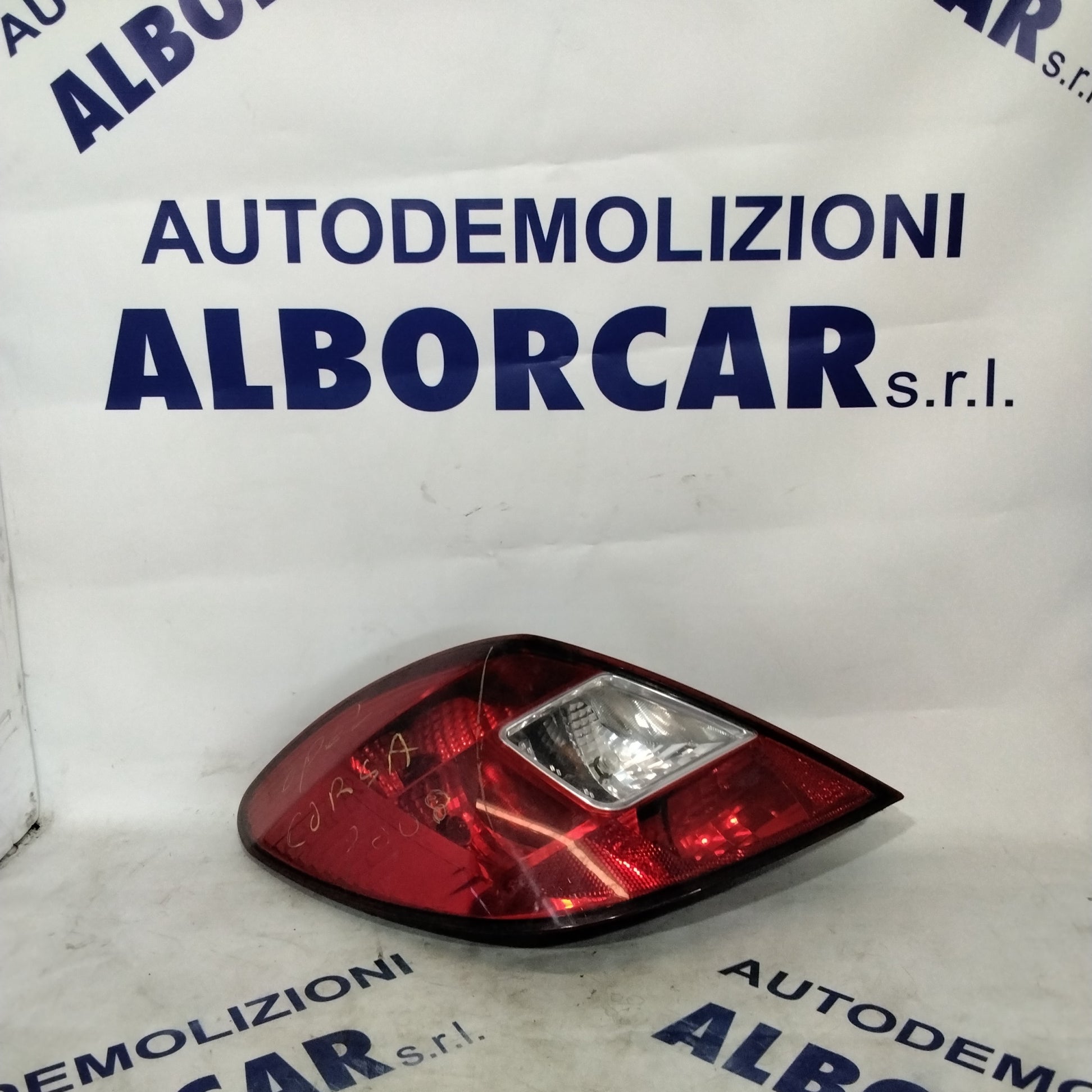 Left rear stop light Opel Corsa 1.2 petrol 5-door code: 13269050 (sf10p1)