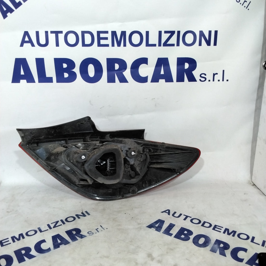 Left rear stop light Opel Corsa 1.2 petrol 5-door code: 13269050 (sf10p1)