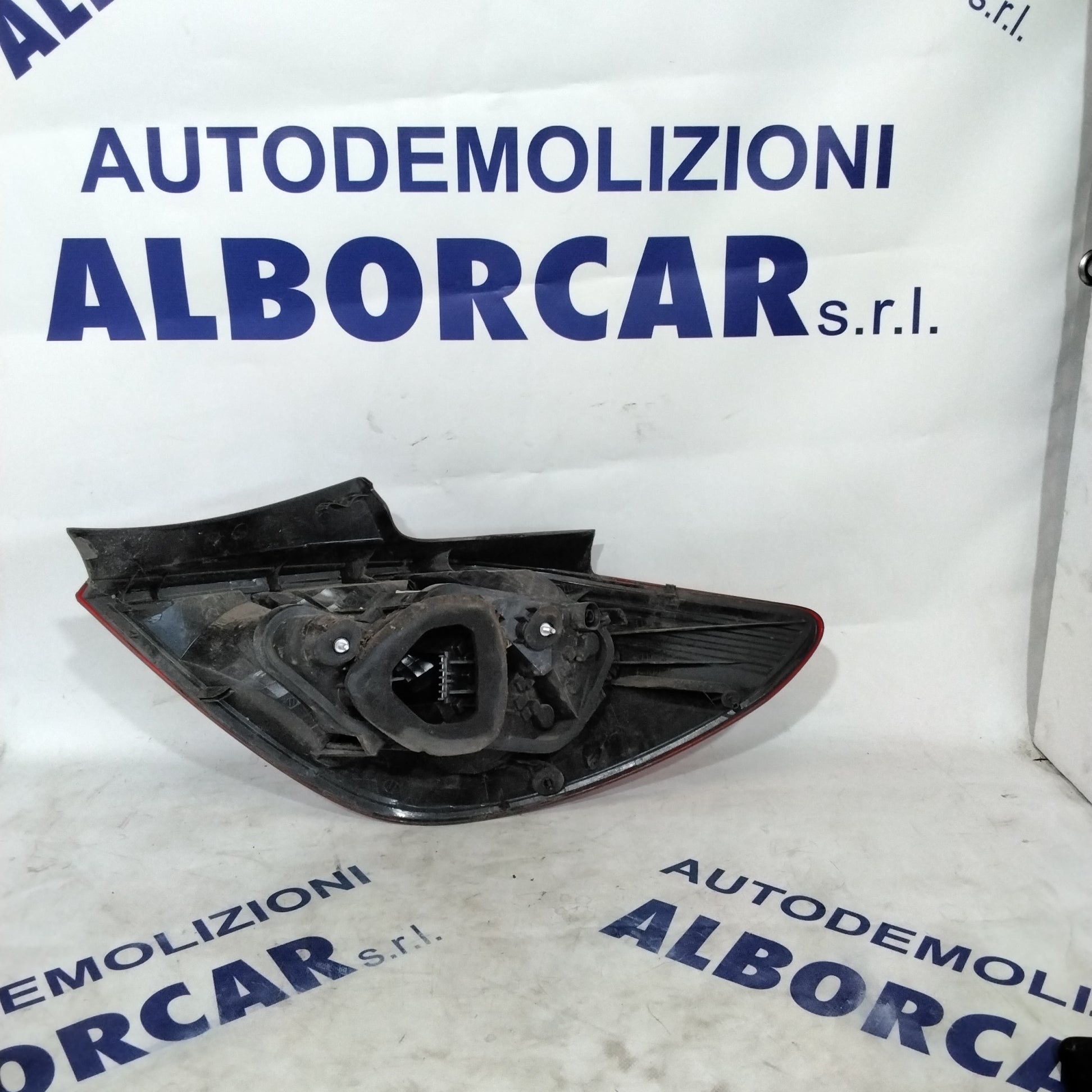 Left rear stop light Opel Corsa 1.2 petrol 5-door code: 13269050 (sf10p1)