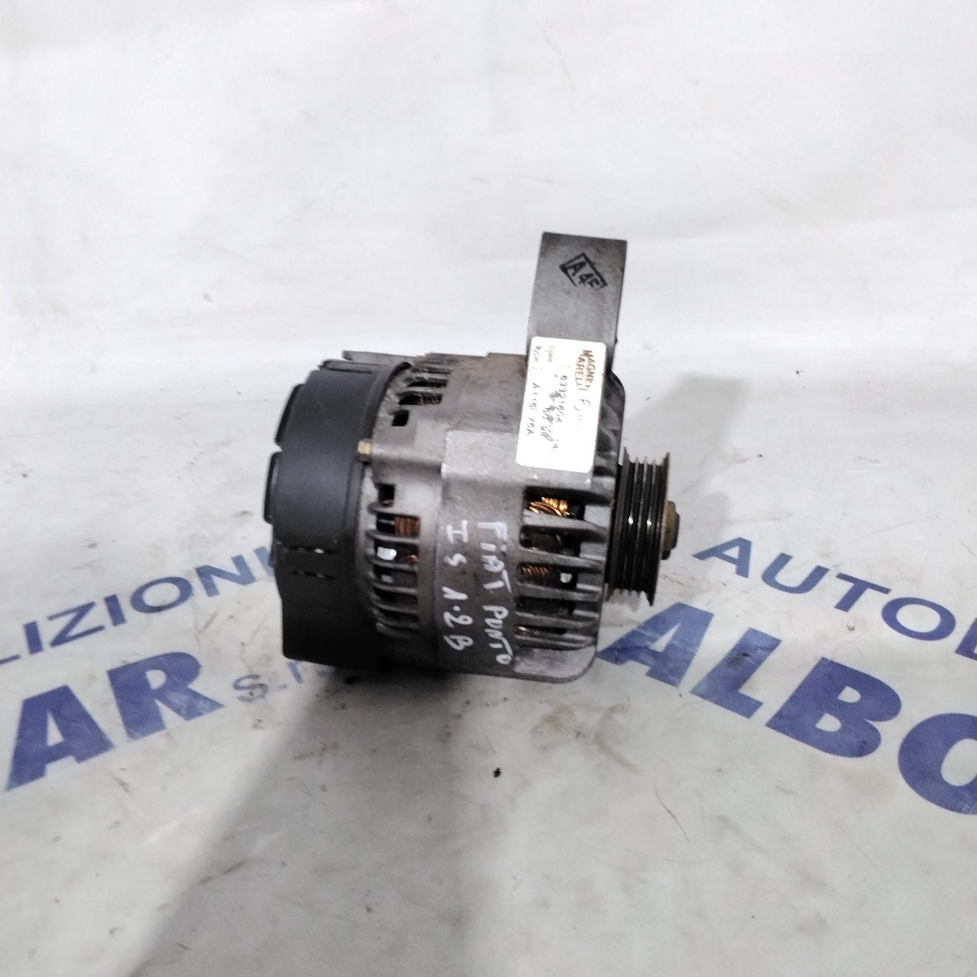 Alternator Fiat Punto first series 1.2 petrol year 1998 code:63321604( sf15p9)