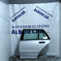 Puerta trasera izquierda Mercedes Clase C200 año 2001 (sf1e1)