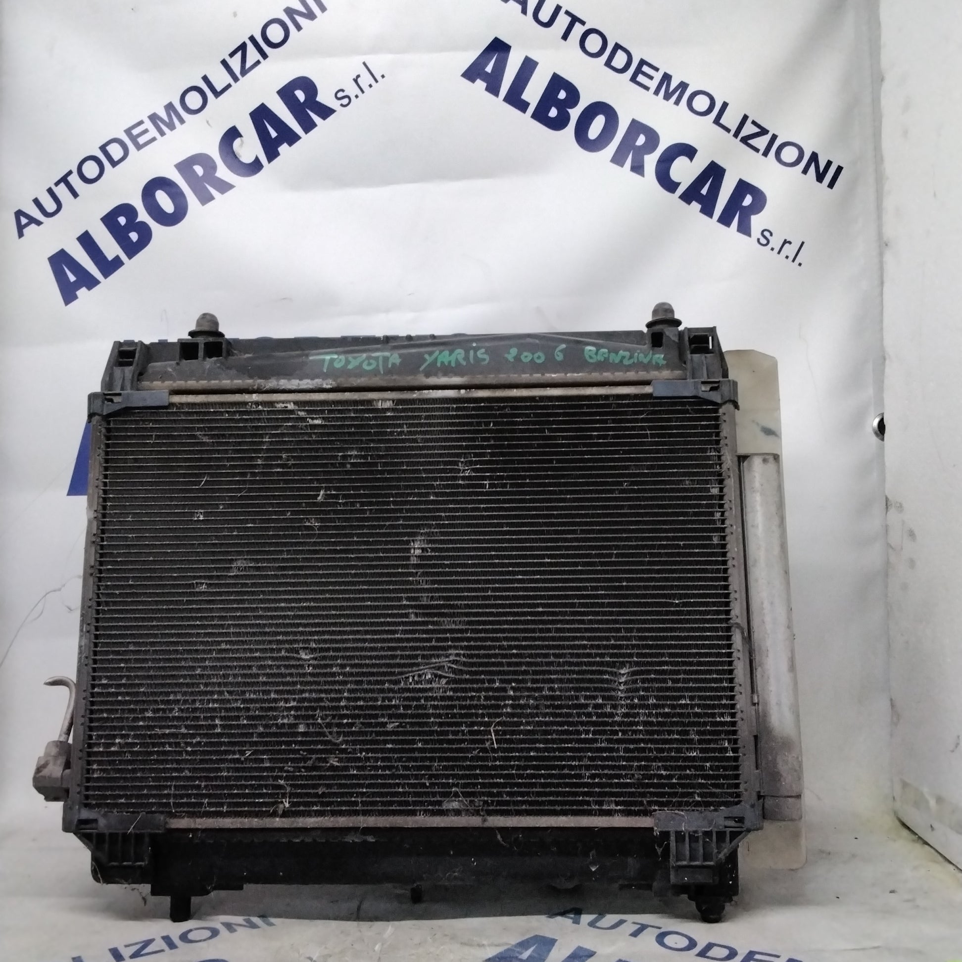 Complete radiator with fan and coolant reservoir for a 2006 Toyota Yaris petrol model.