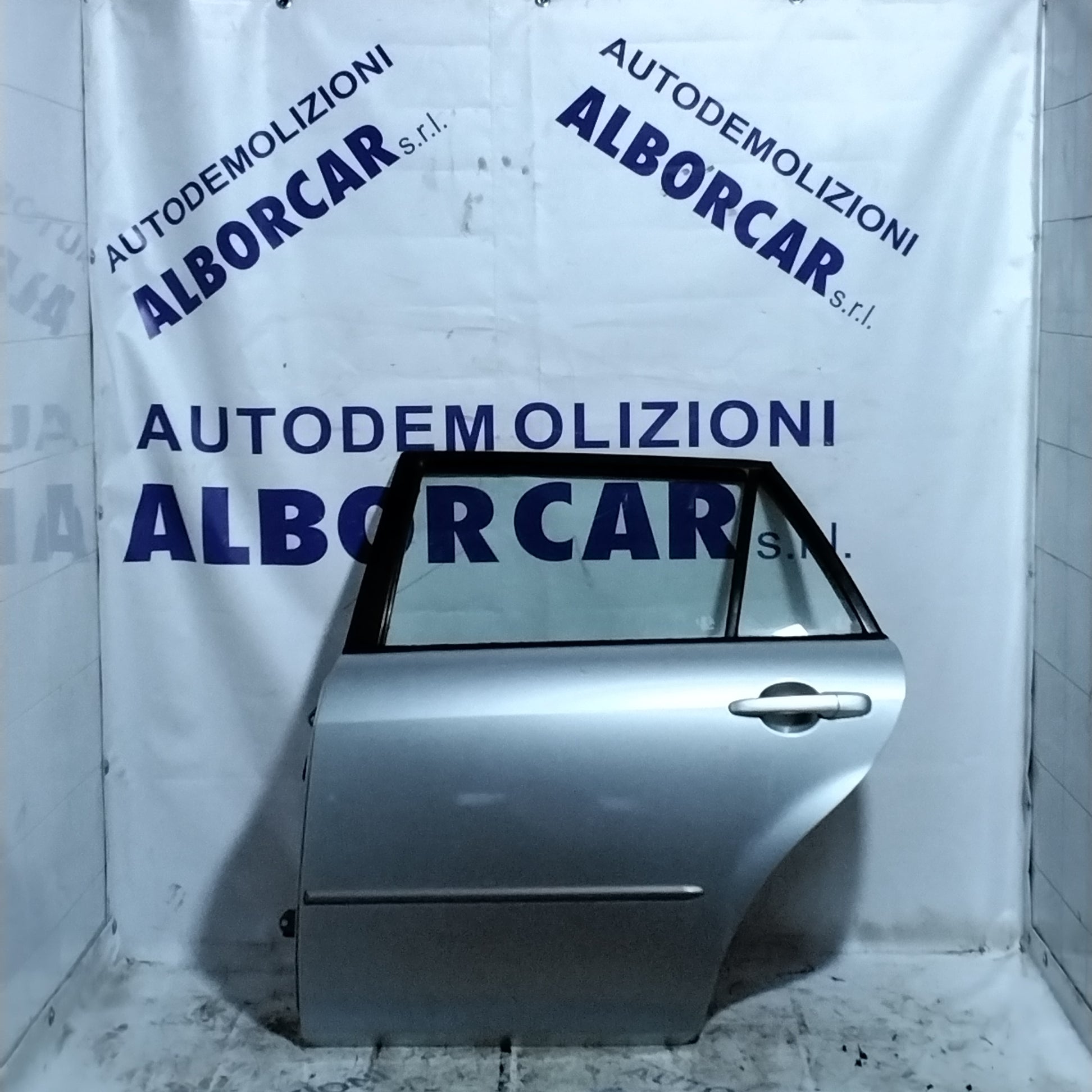 Puerta trasera izquierda Mazda 2.0 TD año 2006