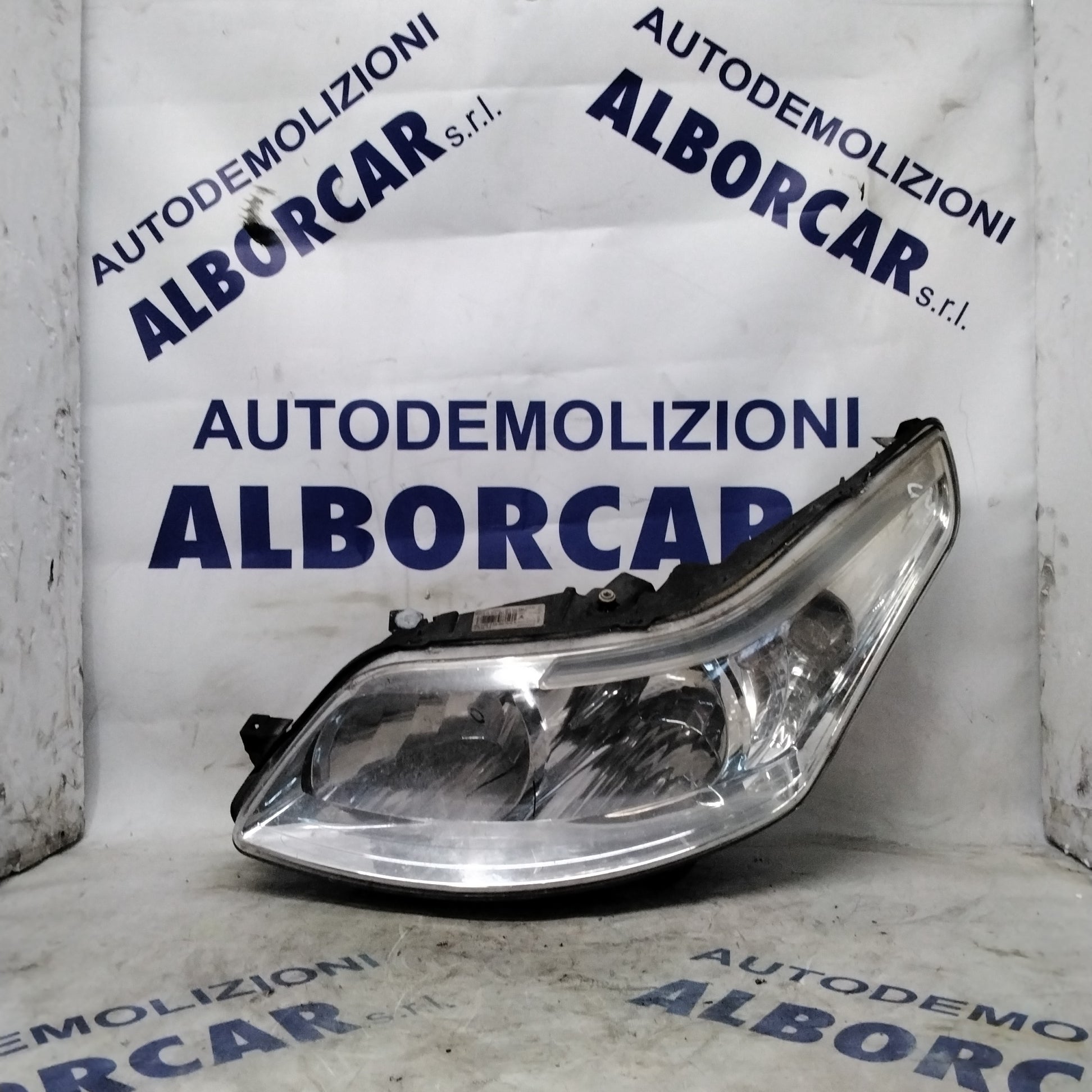 Faro anteriore sinistro citroen C4 codice 9646893980