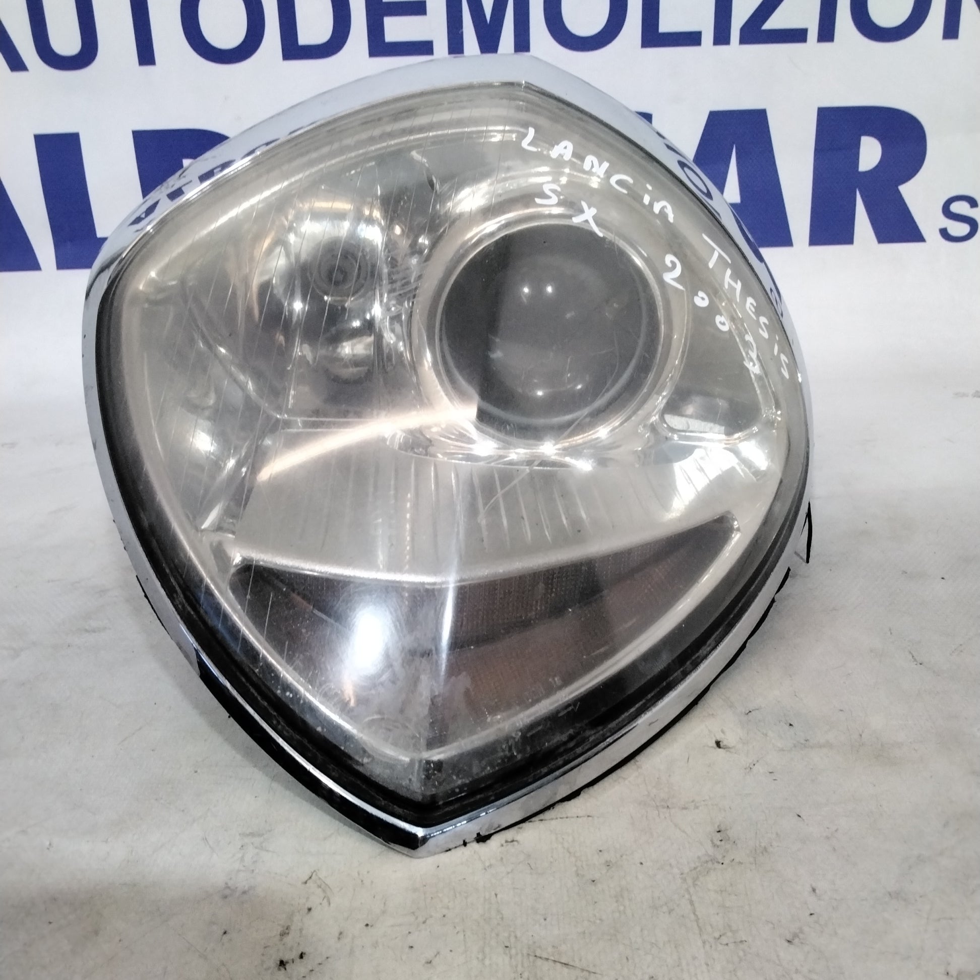 Faro fanale anteriore lancia thesis sinistro anno 2003 codice:'15492500(sf8p1)