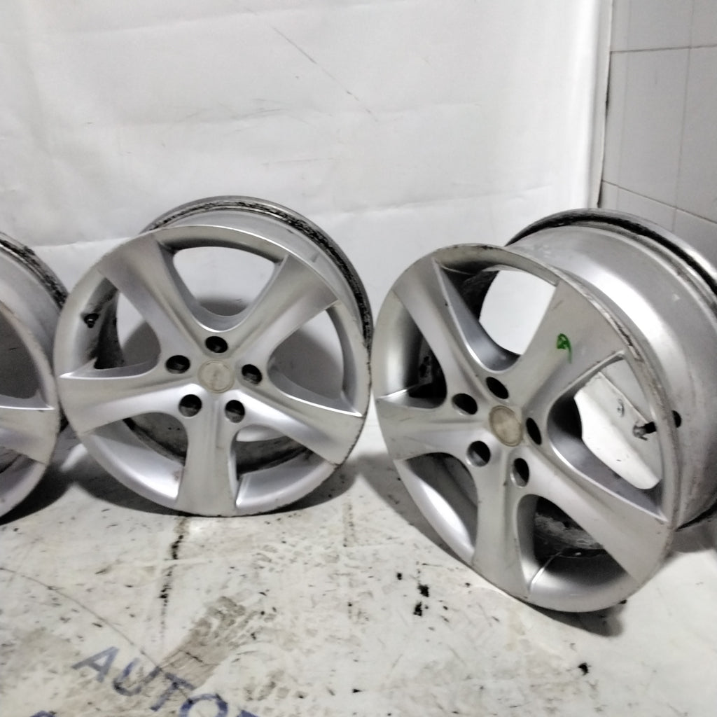 4 cerchi in lega 5 fori  ford 16 pollici