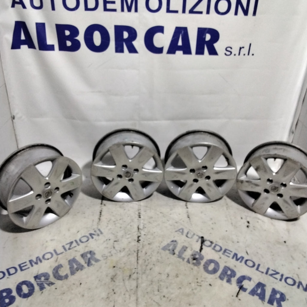 4 cerchi in lega 4 fori NISSAN 15 pollici