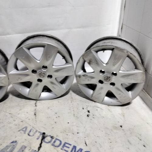 4 NISSAN 15-inch 4-bolt alloy wheels