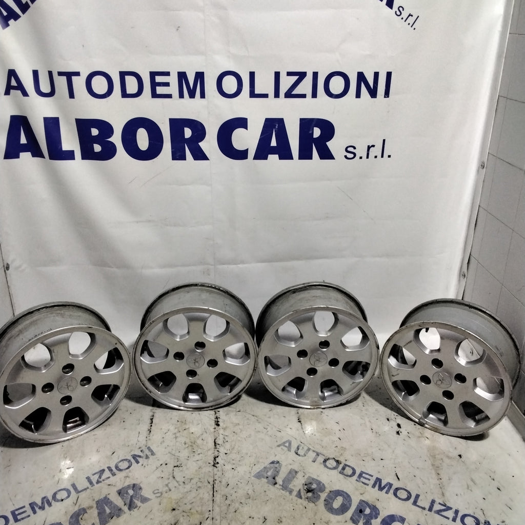 4 cerchi in lega 4 fori MITSUBISHI colt 15 pollici anno 2005