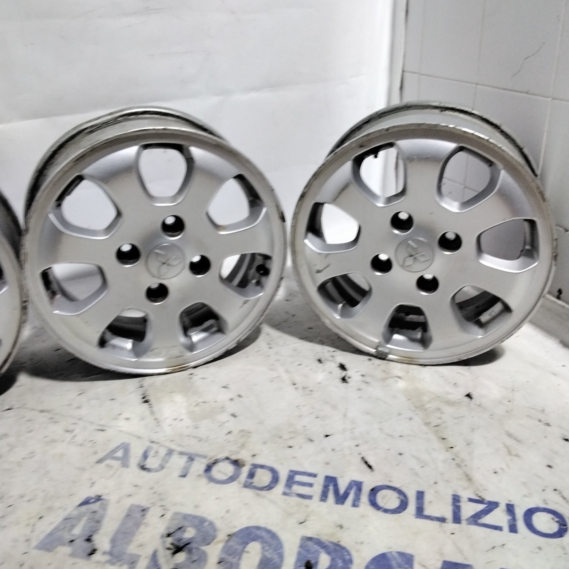 4 cerchi in lega 4 fori MITSUBISHI colt 15 pollici anno 2005
