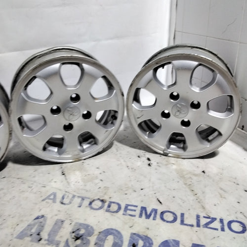 4 alloy wheels 4 holes MITSUBISHI Colt 15 inch year 2005