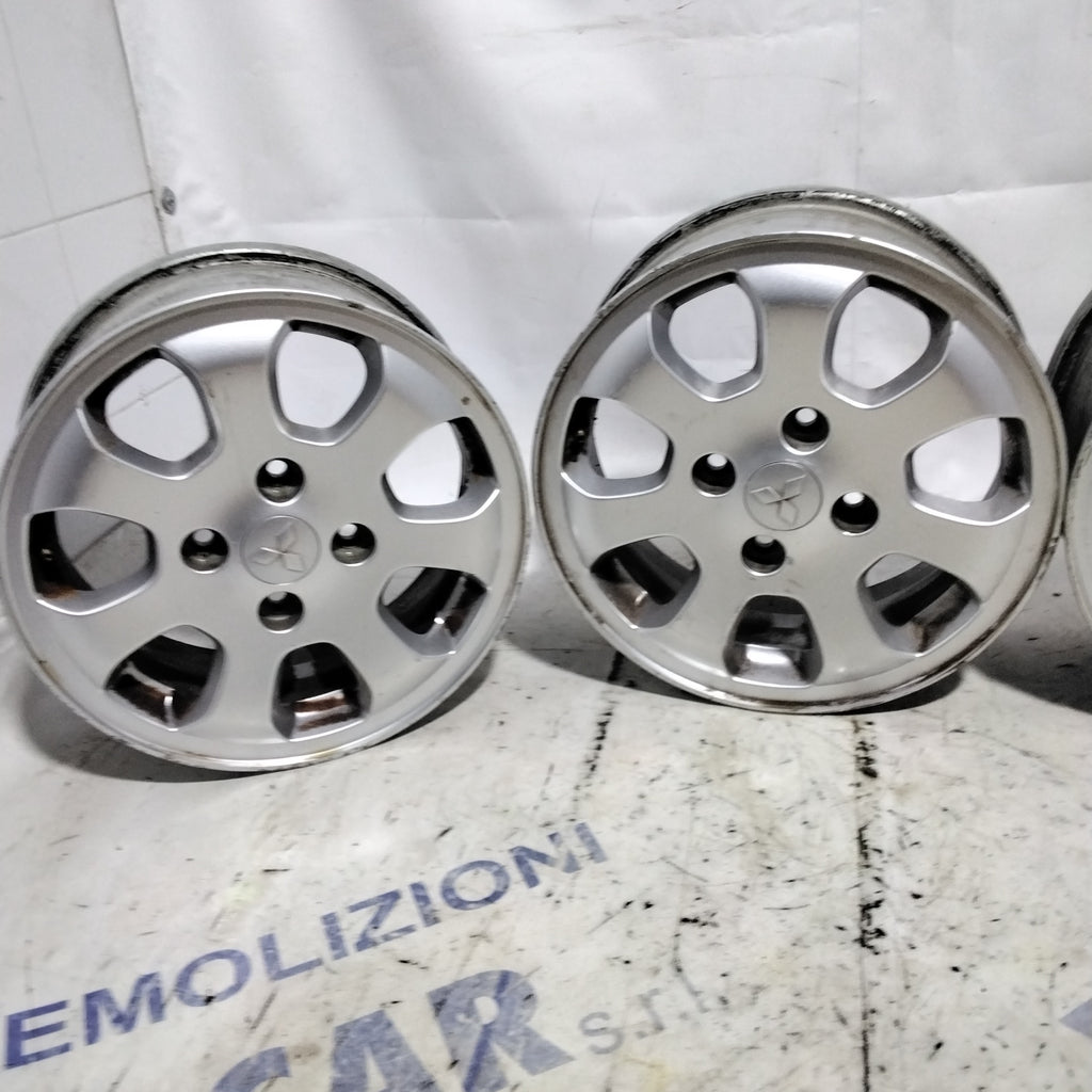 4 cerchi in lega 4 fori MITSUBISHI colt 15 pollici anno 2005