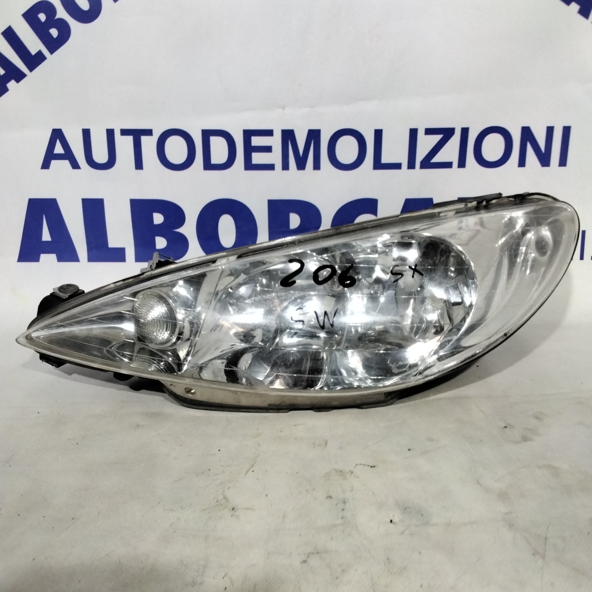 Faro fanale sinistro PEUGEOT 206 SW anno 2005 codice:89000521
