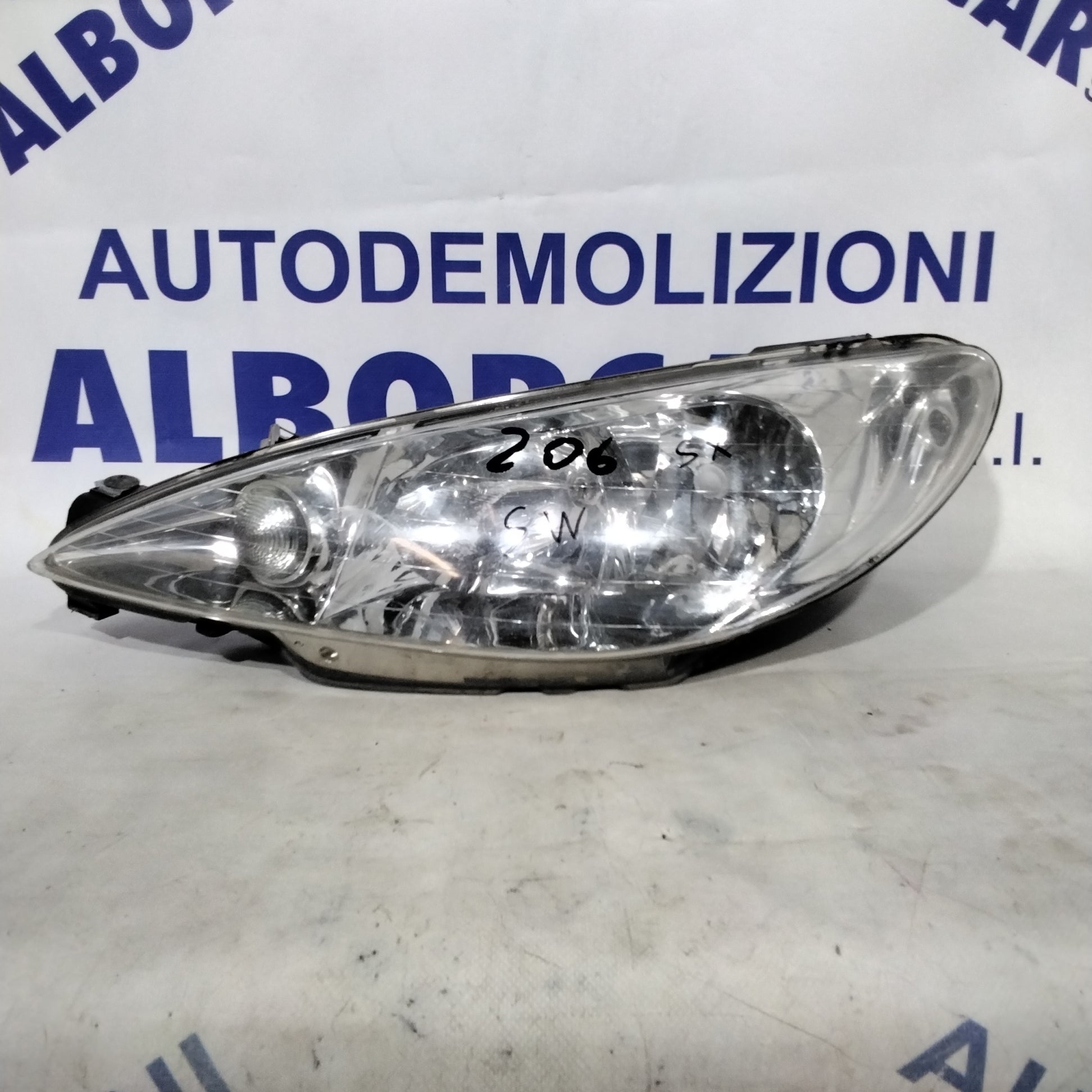 Faro fanale sinistro PEUGEOT 206 SW anno 2005 codice:89000521