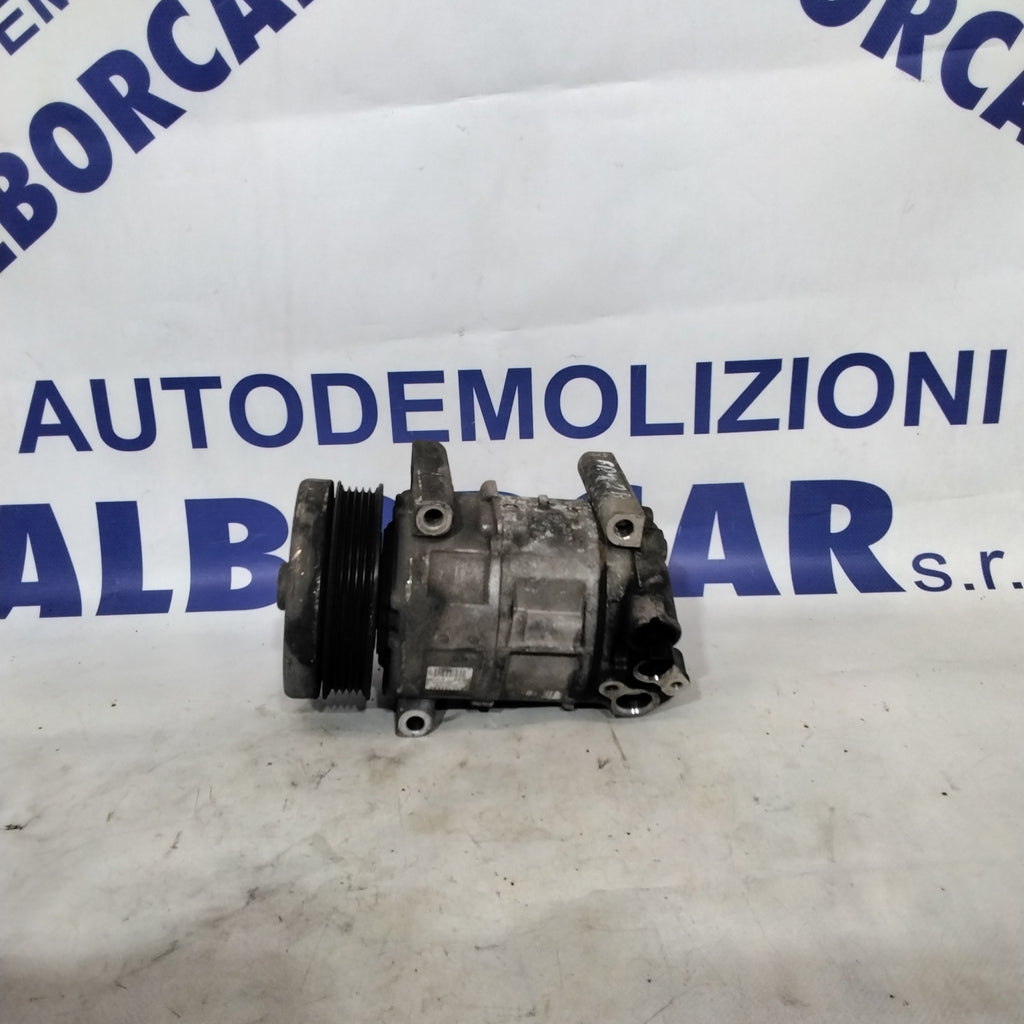 Compresor aire acondicionado Fiat Grande Punto 1.2 gasolina año 2006 código:55194880