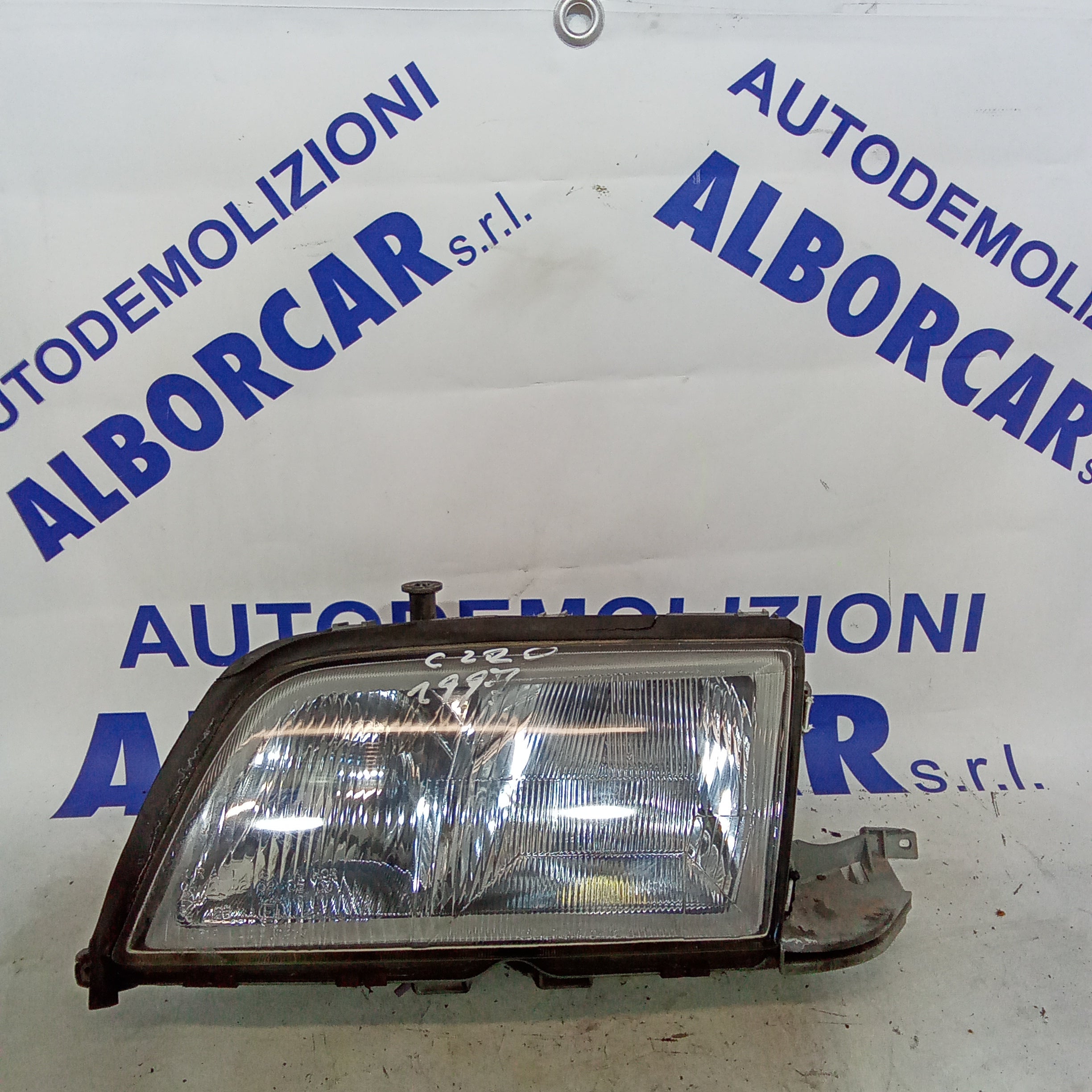 Faro anteriore sinistro mercedes C220 anno 1997