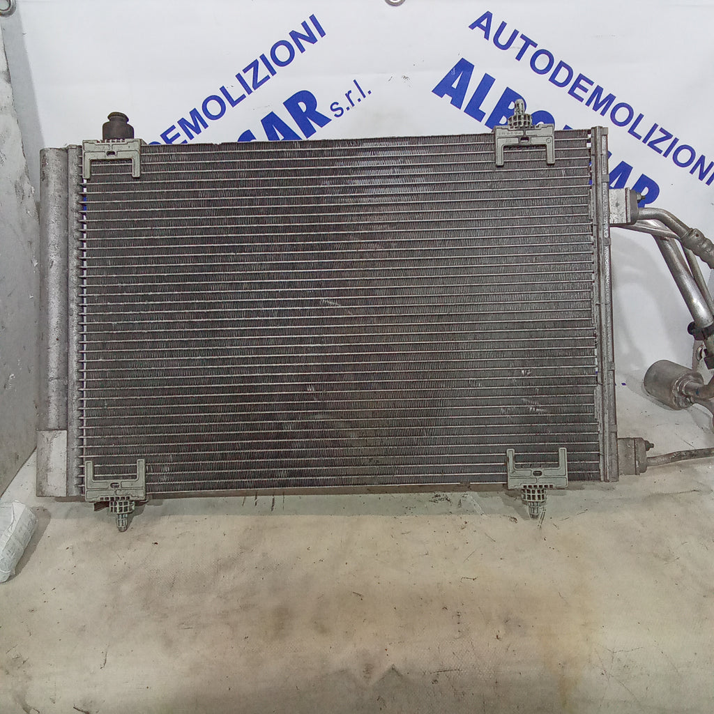 Radiatore raffreddamento aria condizionata citroen C4 1.4 16v codice 7402415