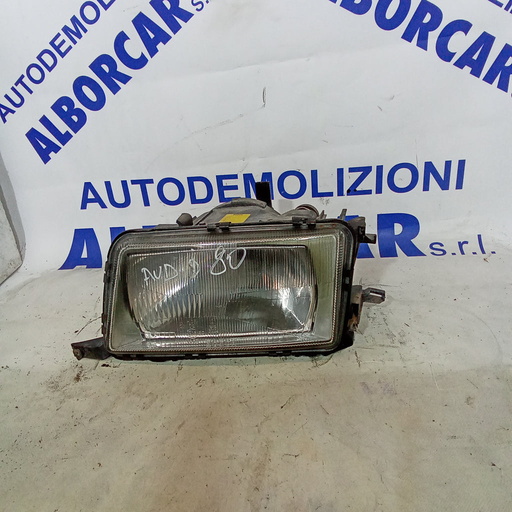 Faro anteriore sinistro audi 80 codice 0301075111