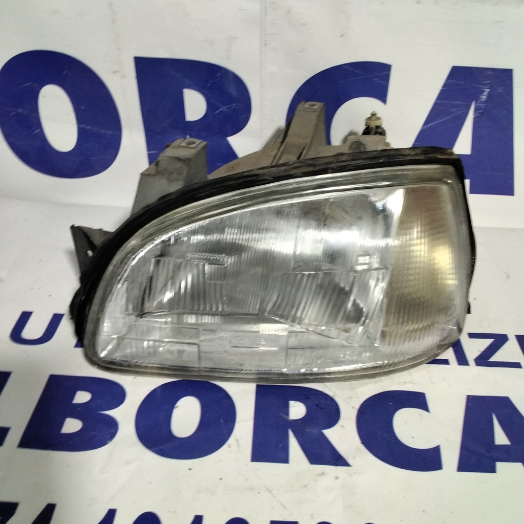 Faro fanale sinistro renault clio anno 1995
