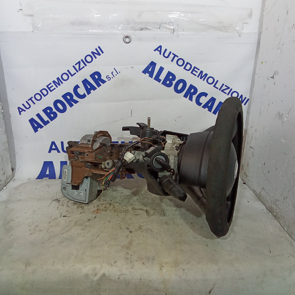 Columna de dirección + dirección asistida + mandos del volante + volante Nissan Micra diésel año 2004