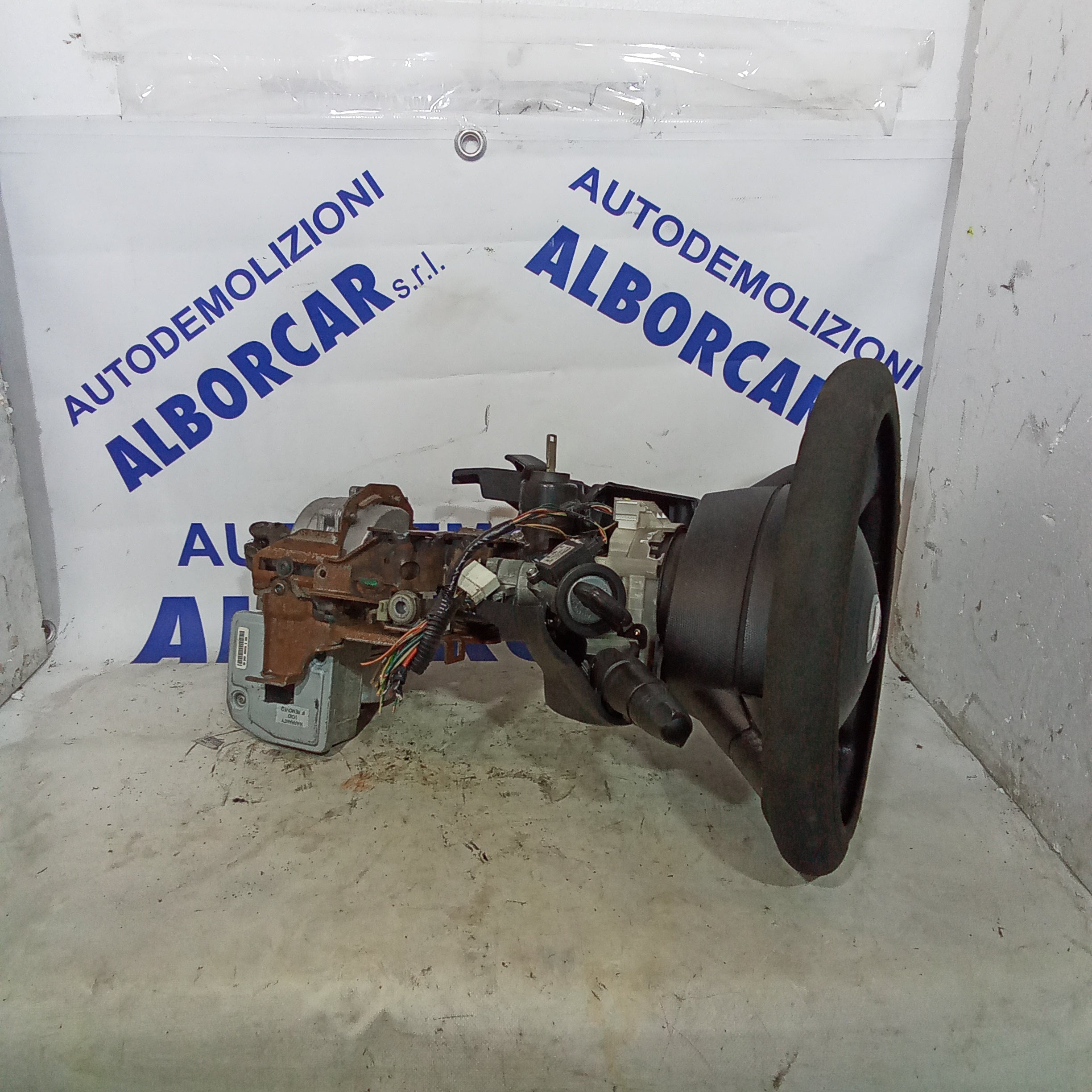Columna de dirección + dirección asistida + mandos del volante + volante Nissan Micra diésel año 2004