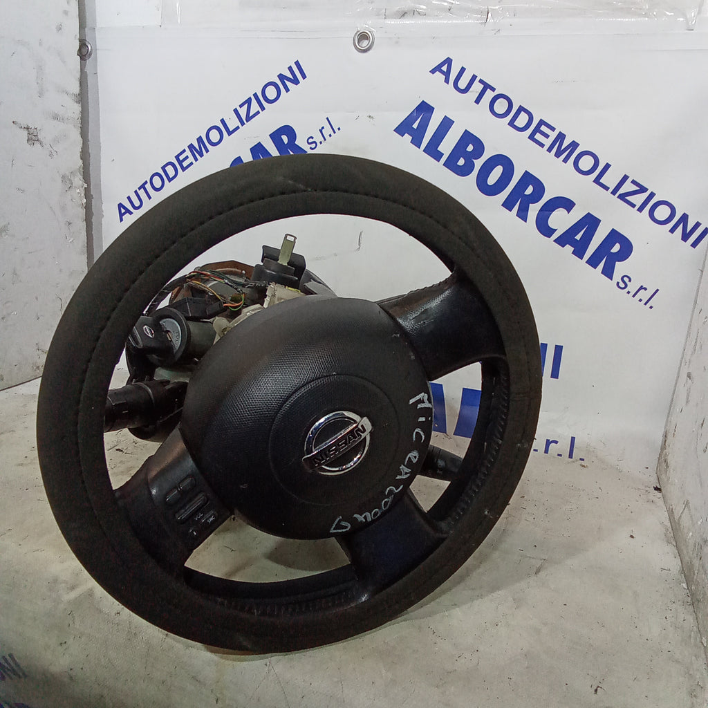 Columna de dirección + dirección asistida + mandos del volante + volante Nissan Micra diésel año 2004