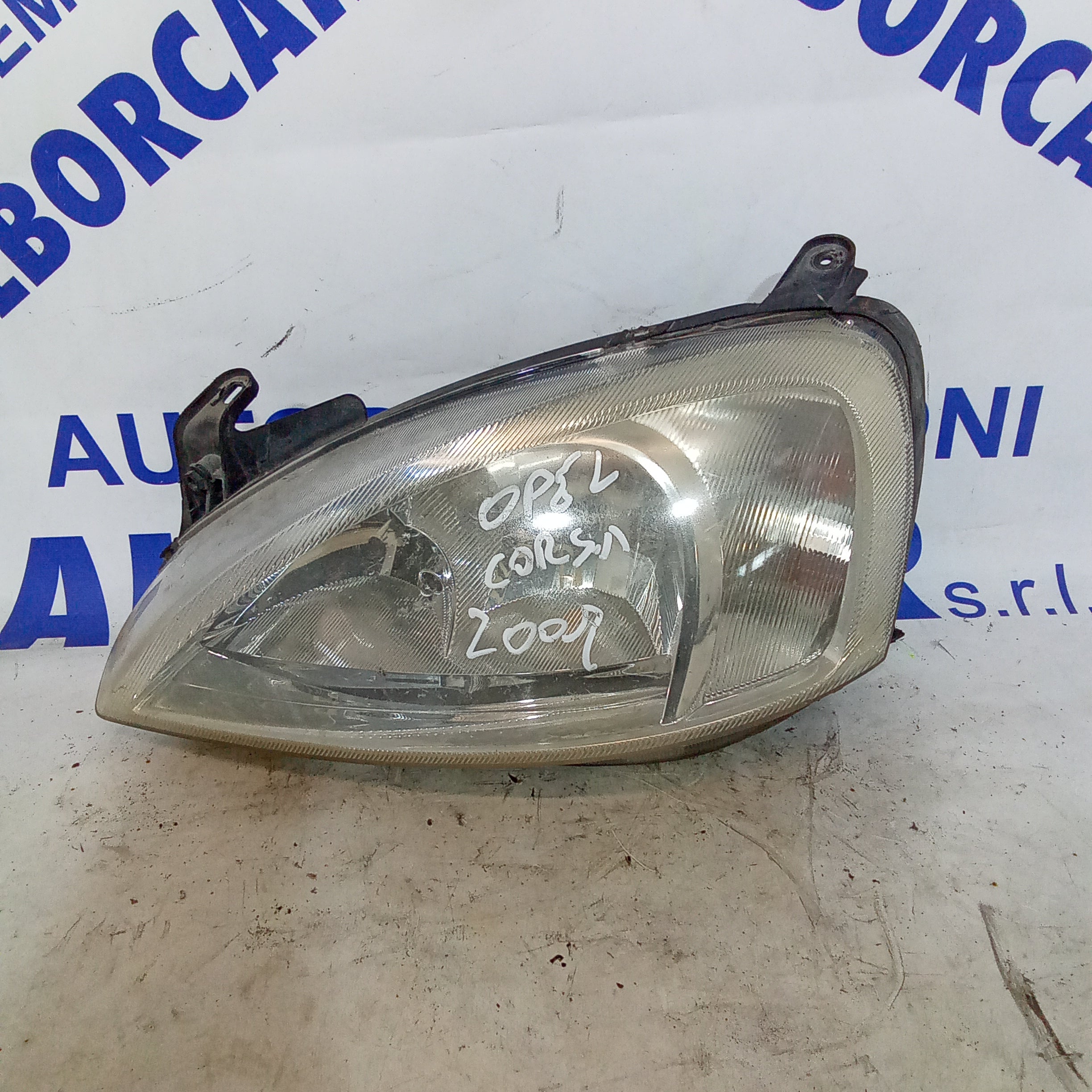 Faro delantero izquierdo Opel Corsa año 2007 código 09114329