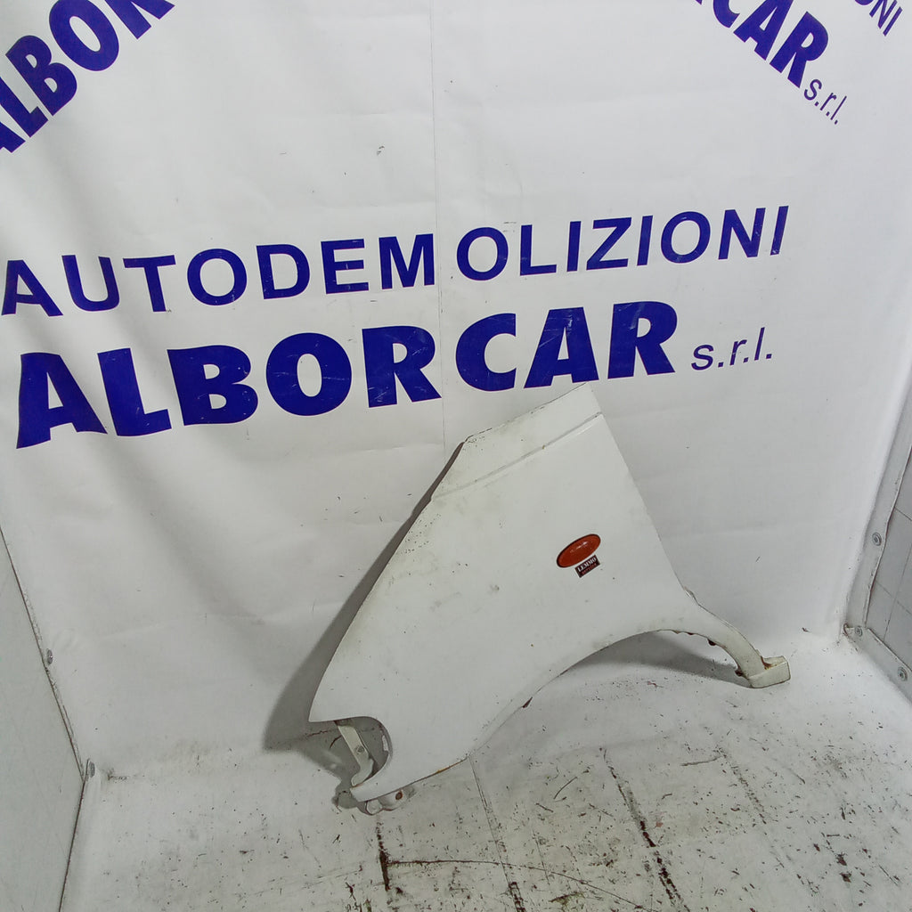 parafango fianchetto anteriore sinistro  Nissan vanette diesel anno 2000