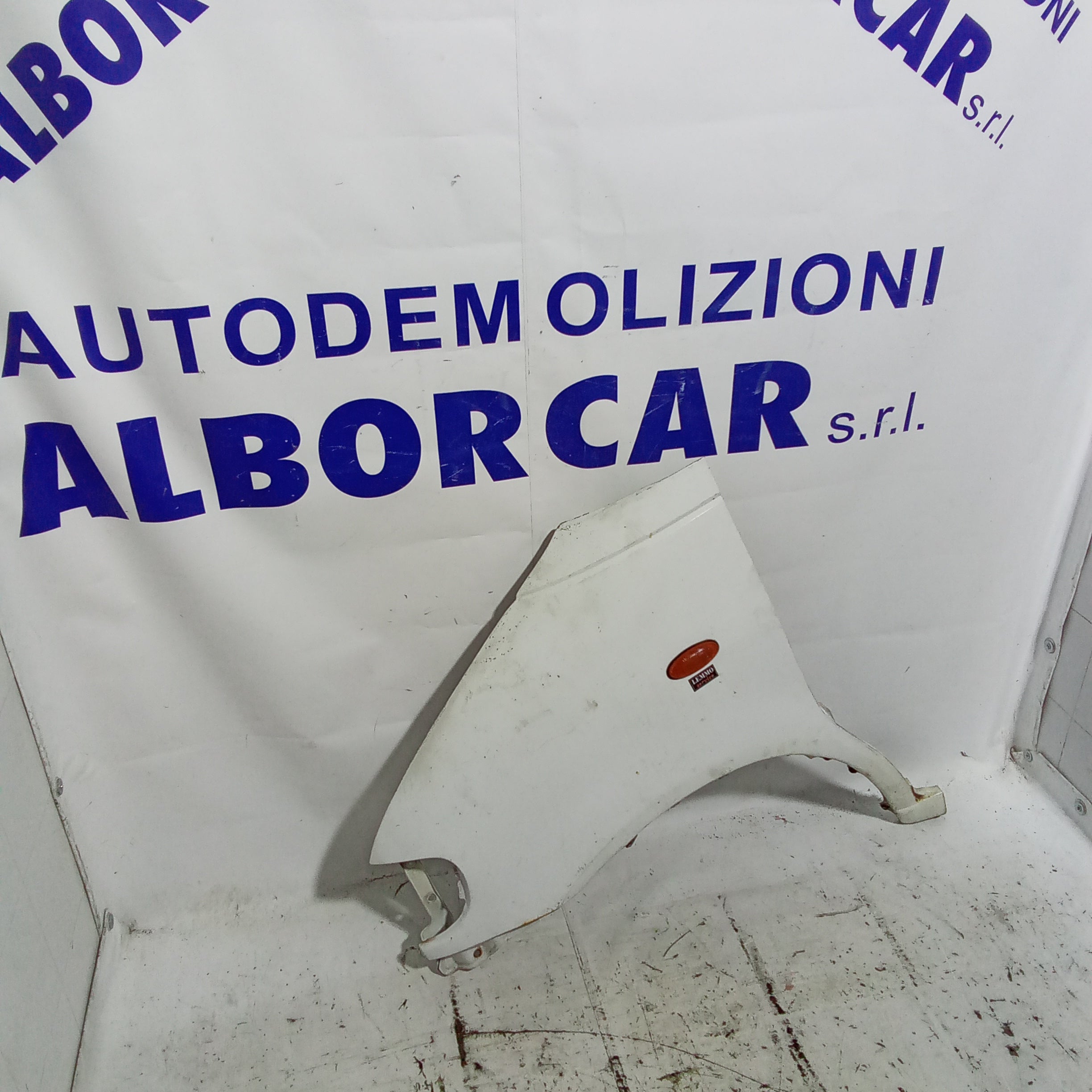 parafango fianchetto anteriore sinistro  Nissan vanette diesel anno 2000