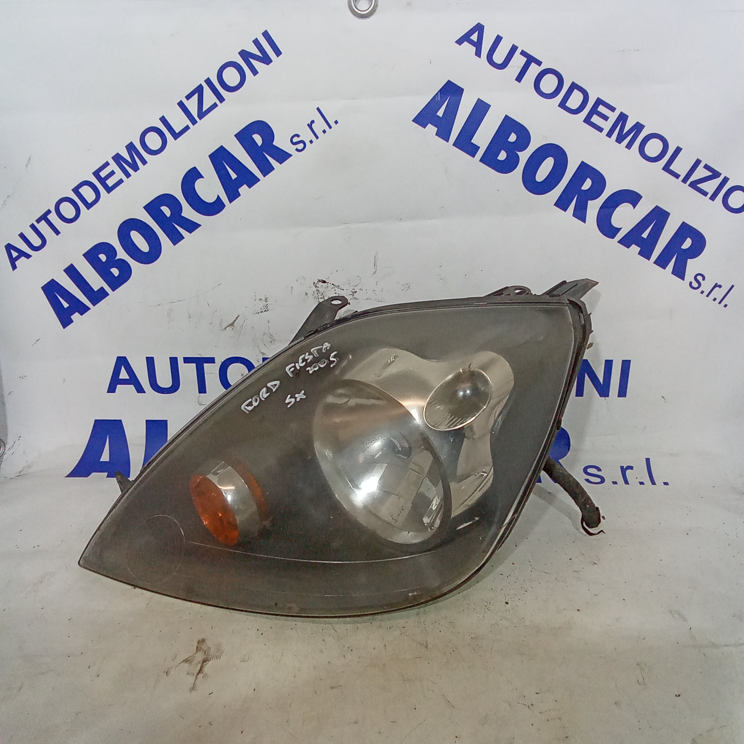 left front headlight Ford Fiesta 1.4tdci year 2005 code 0301224301