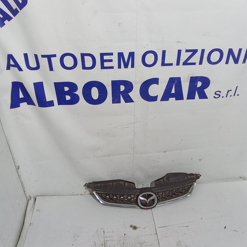 mascherina griglia frontale mazda 2 anno 2005