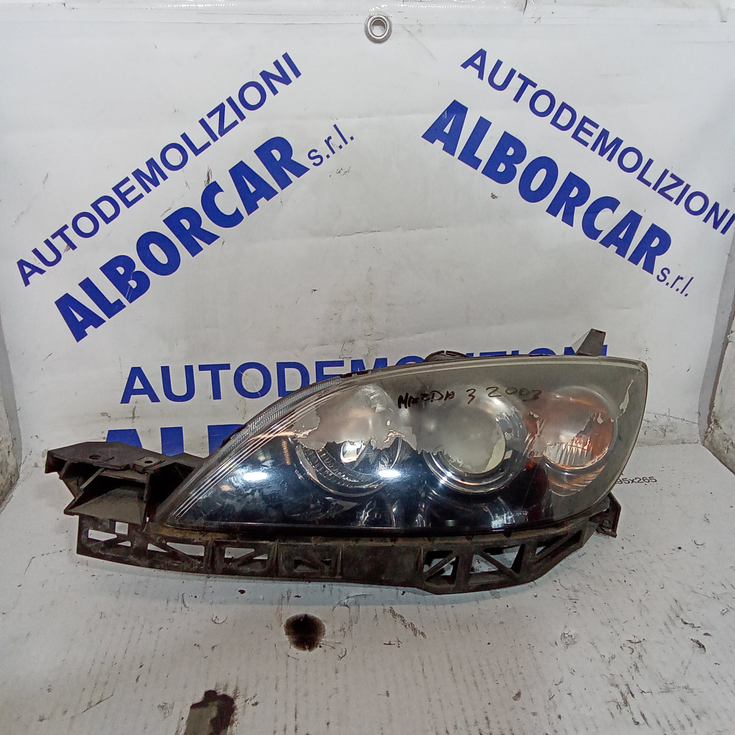 left front headlight mazda3 year 2003 (discounted)