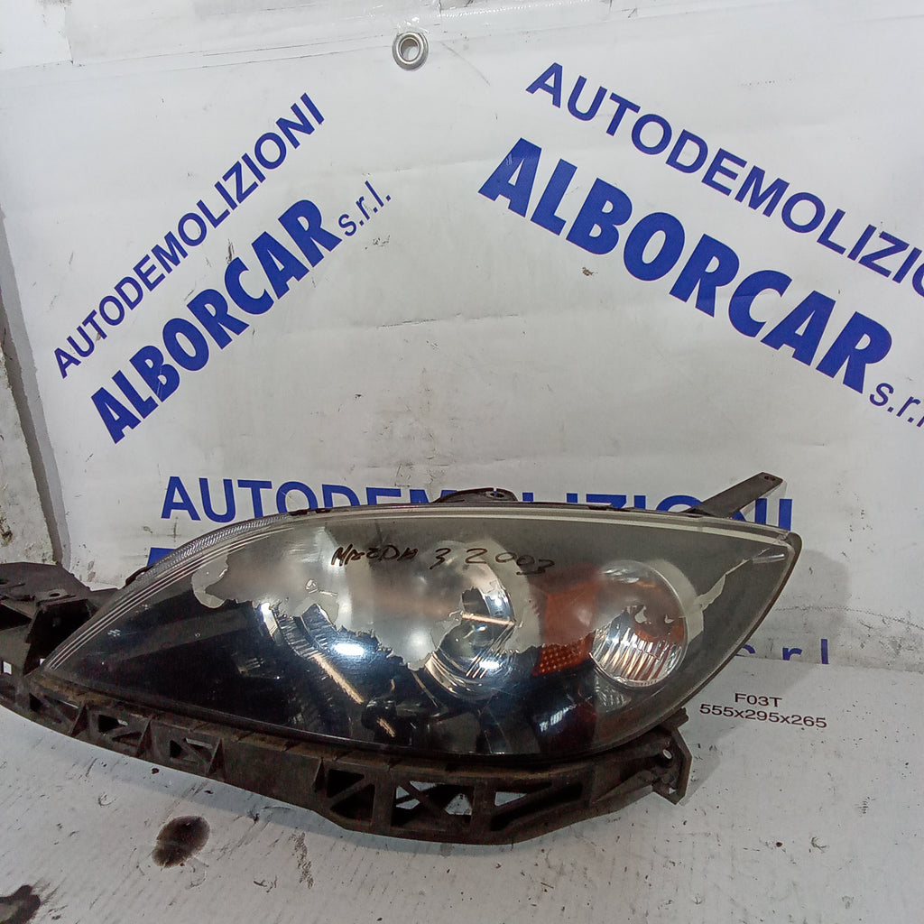 left front headlight mazda3 year 2003 (discounted)