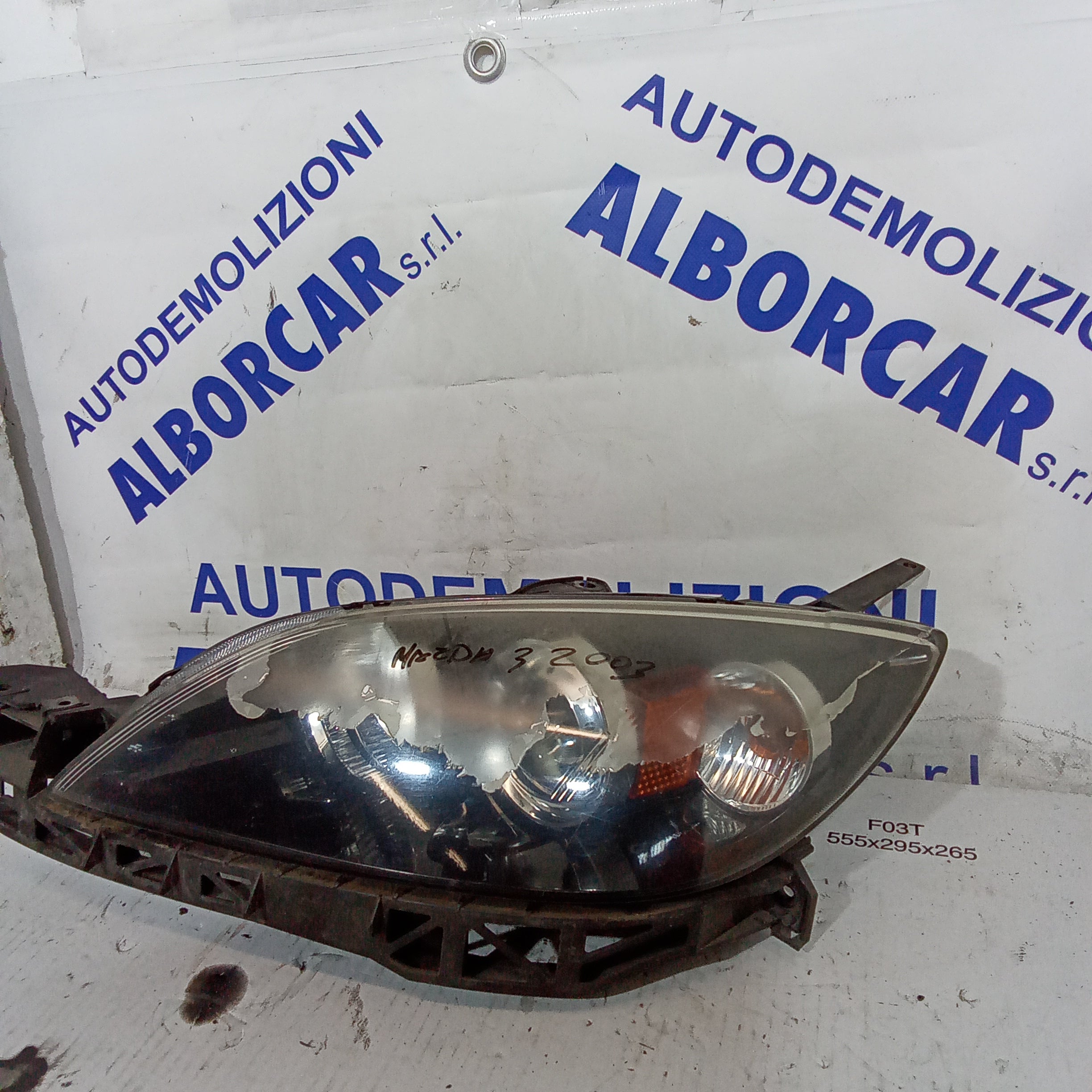 left front headlight mazda3 year 2003 (discounted)