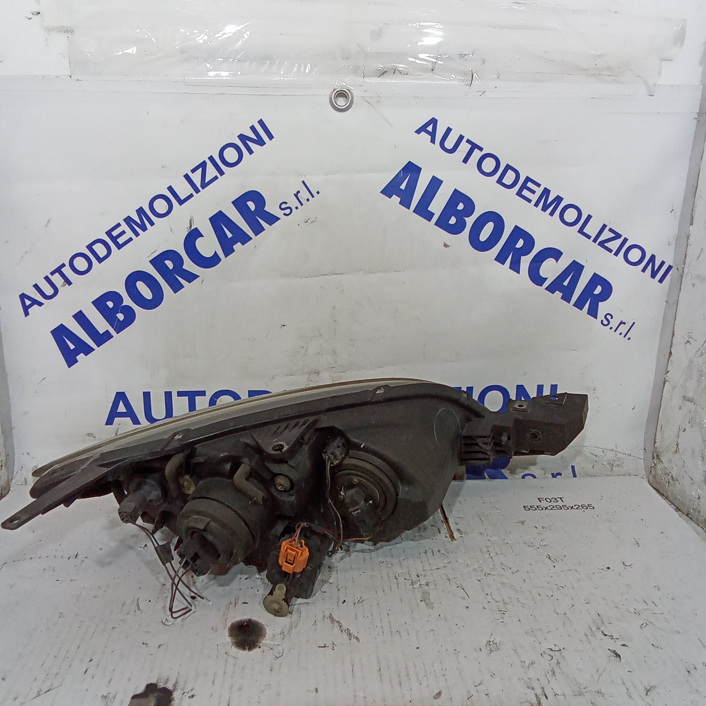 left front headlight mazda3 year 2003 (discounted)