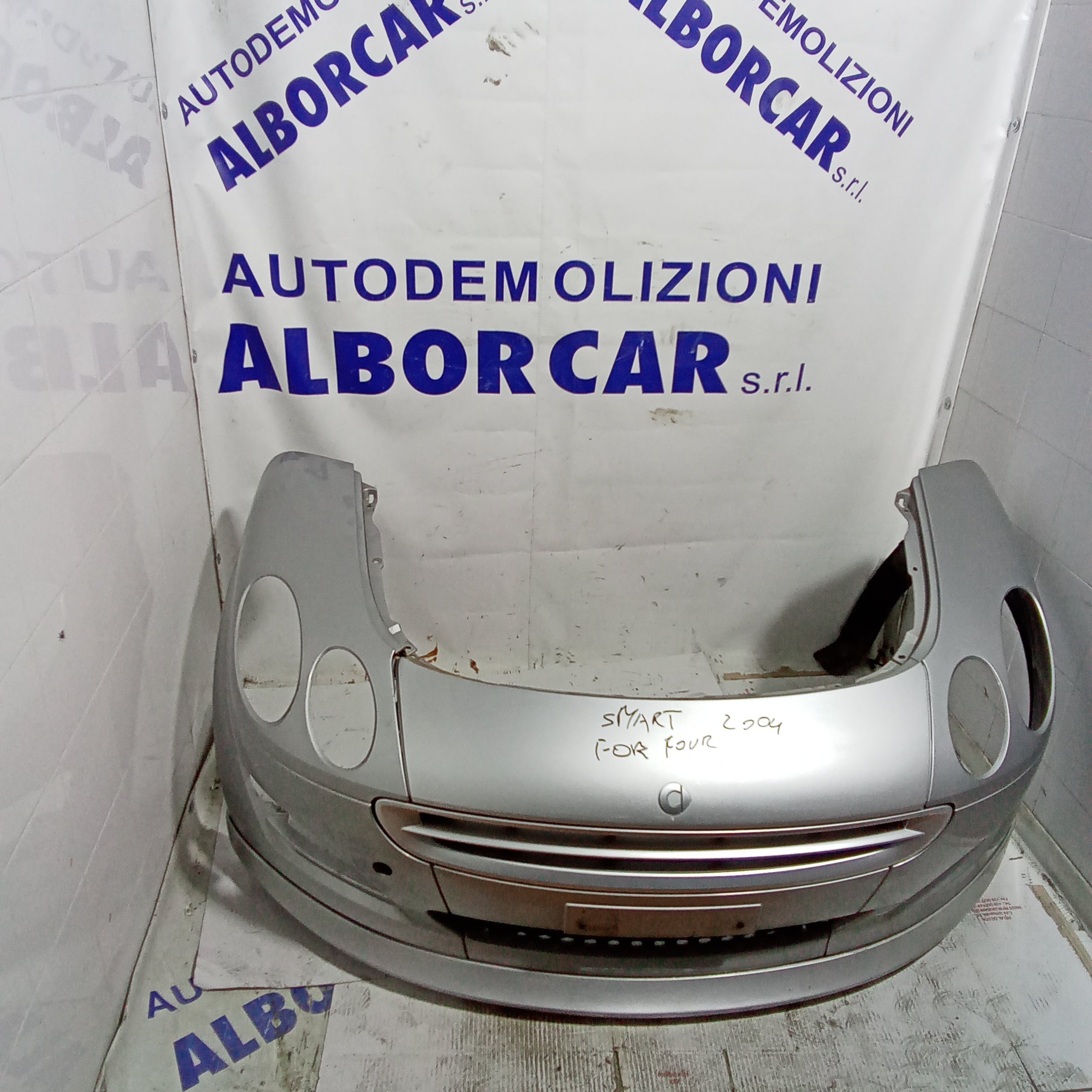 Complete front bumper smart for four year 2004