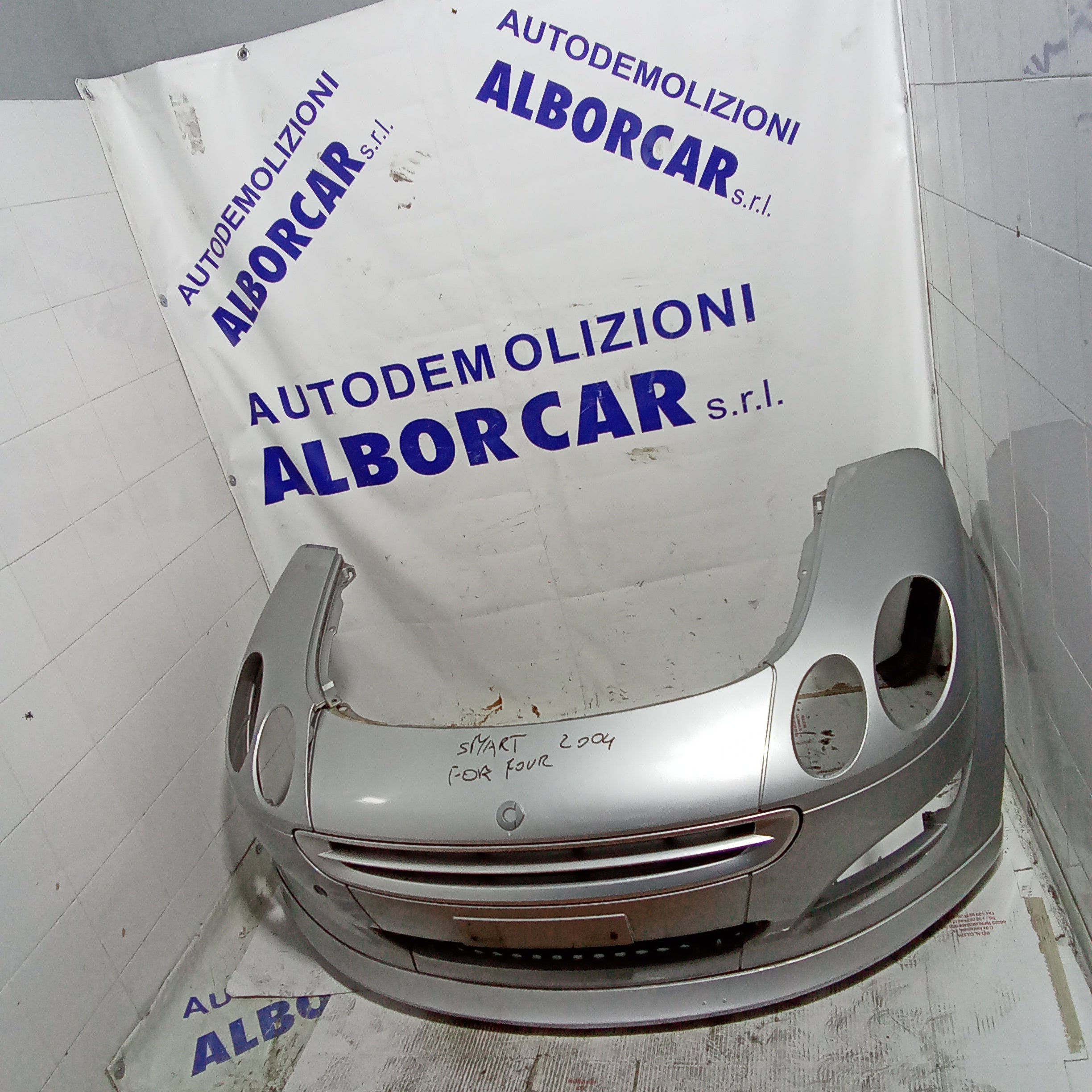Complete front bumper smart for four year 2004